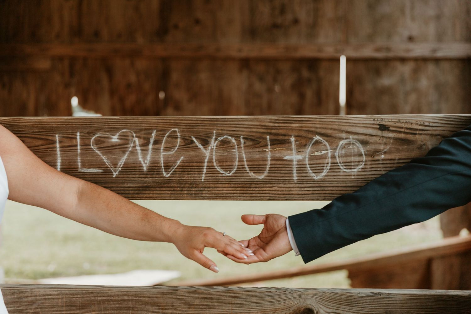 Close up of hands holding during special moment.