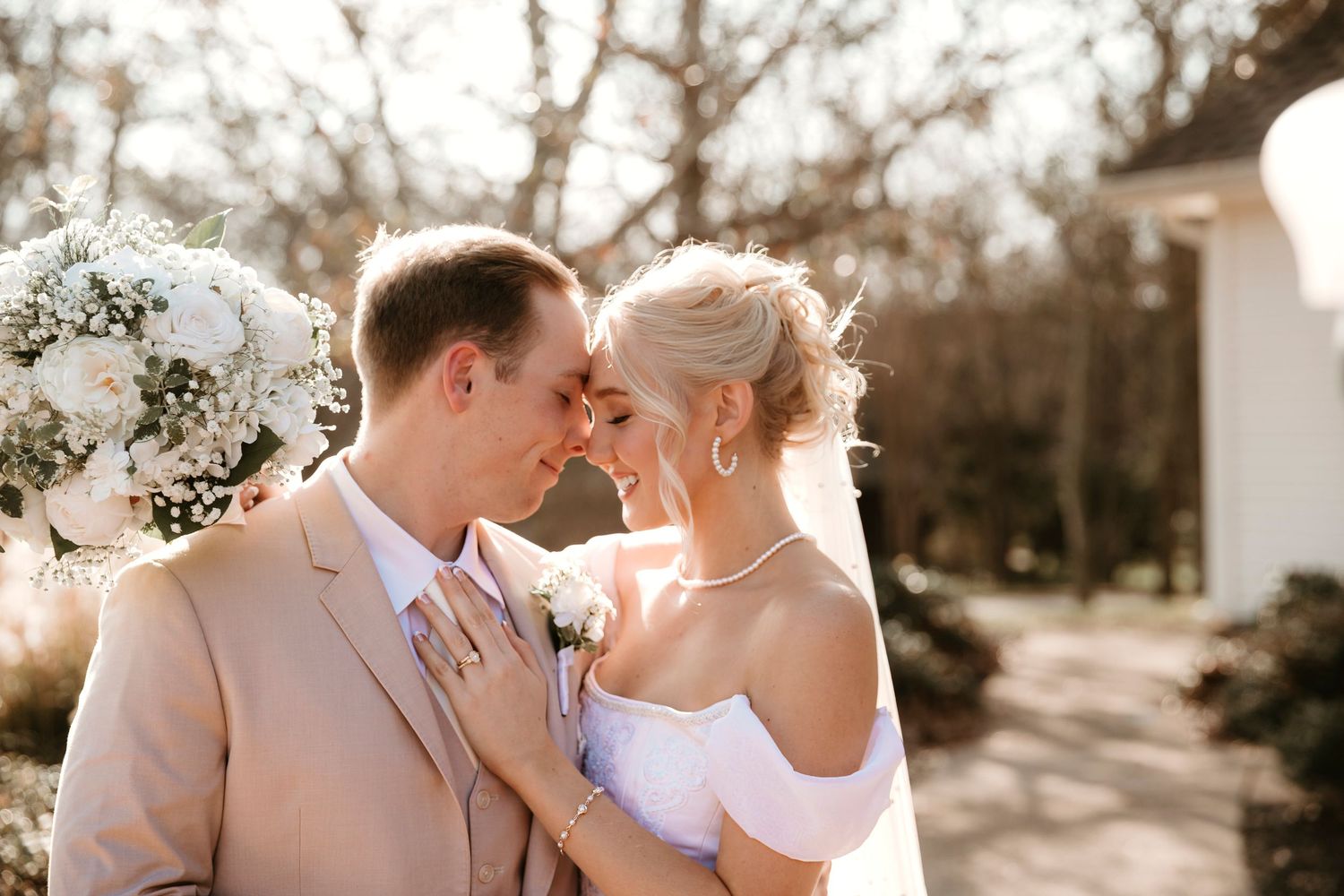 A romantic wedding couple shares intimate kisses in a series of four outdoor photos at sunset.