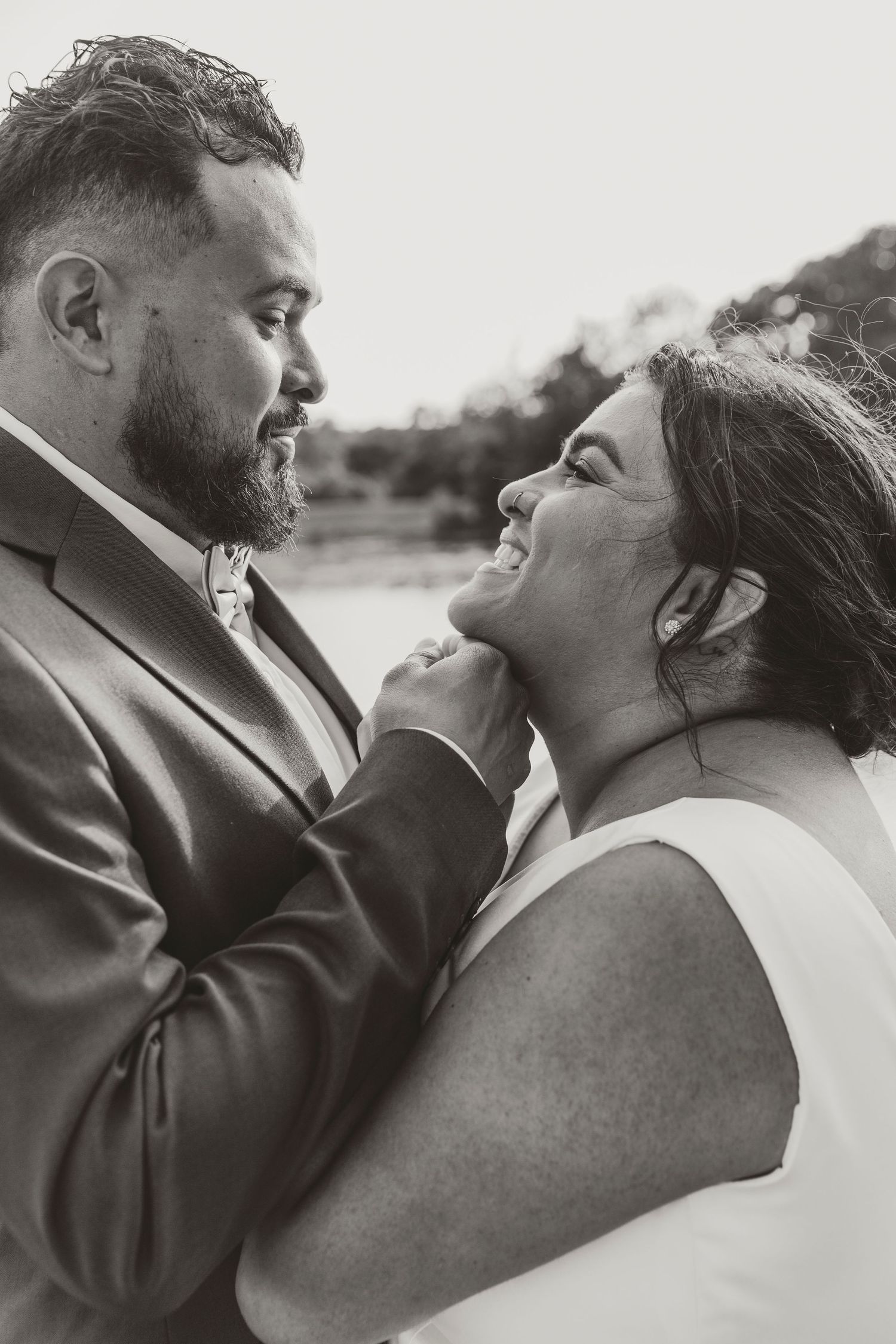 Black and white series capturing intimate side profile moments between a couple.