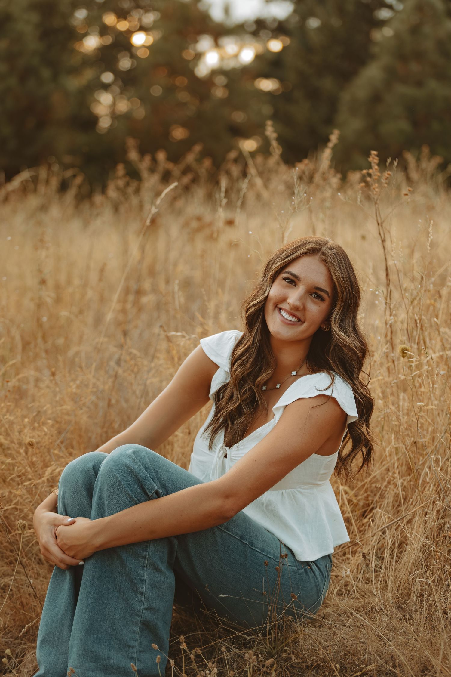 A series of outdoor portraits in golden wheat field during sunset with warm autumn lighting and natural poses.