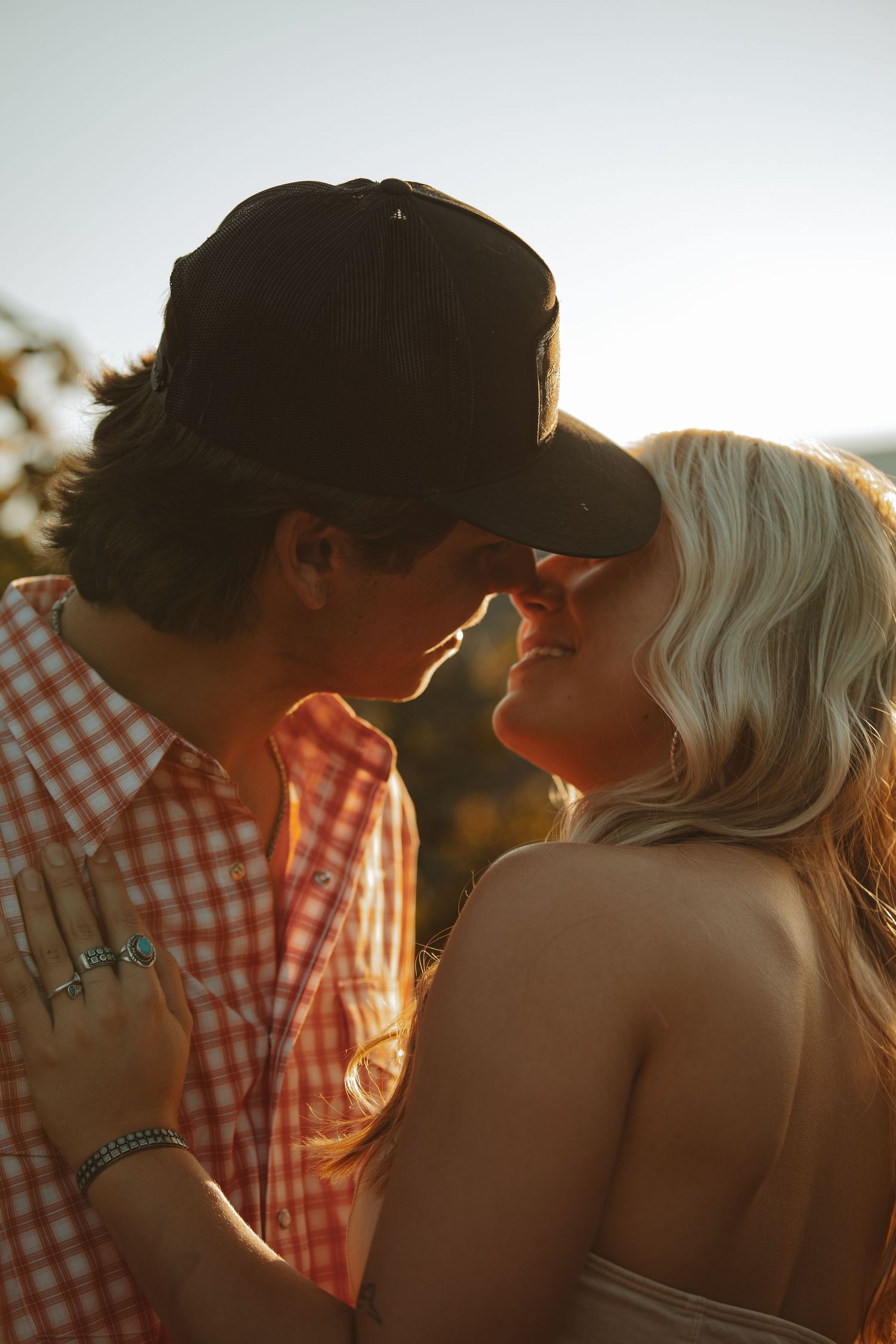 Romantic sunset moment captured in warm golden light.