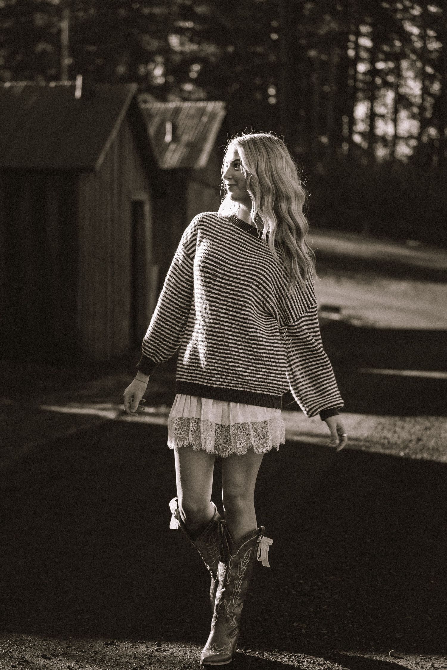 Black and white photo series featuring striped sweaters and movement in outdoor setting.