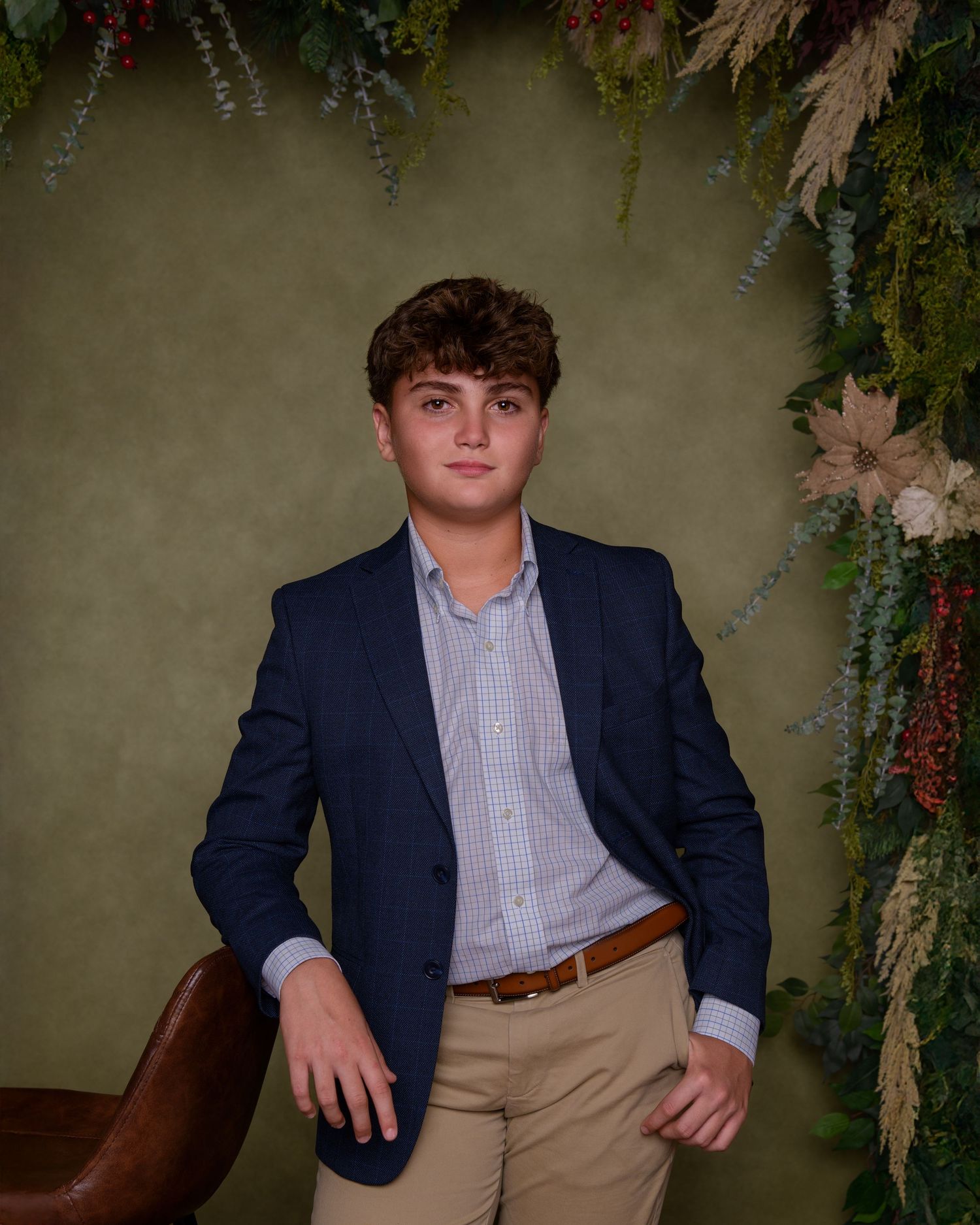 Teenage boy during a Houston portrait session in studio.