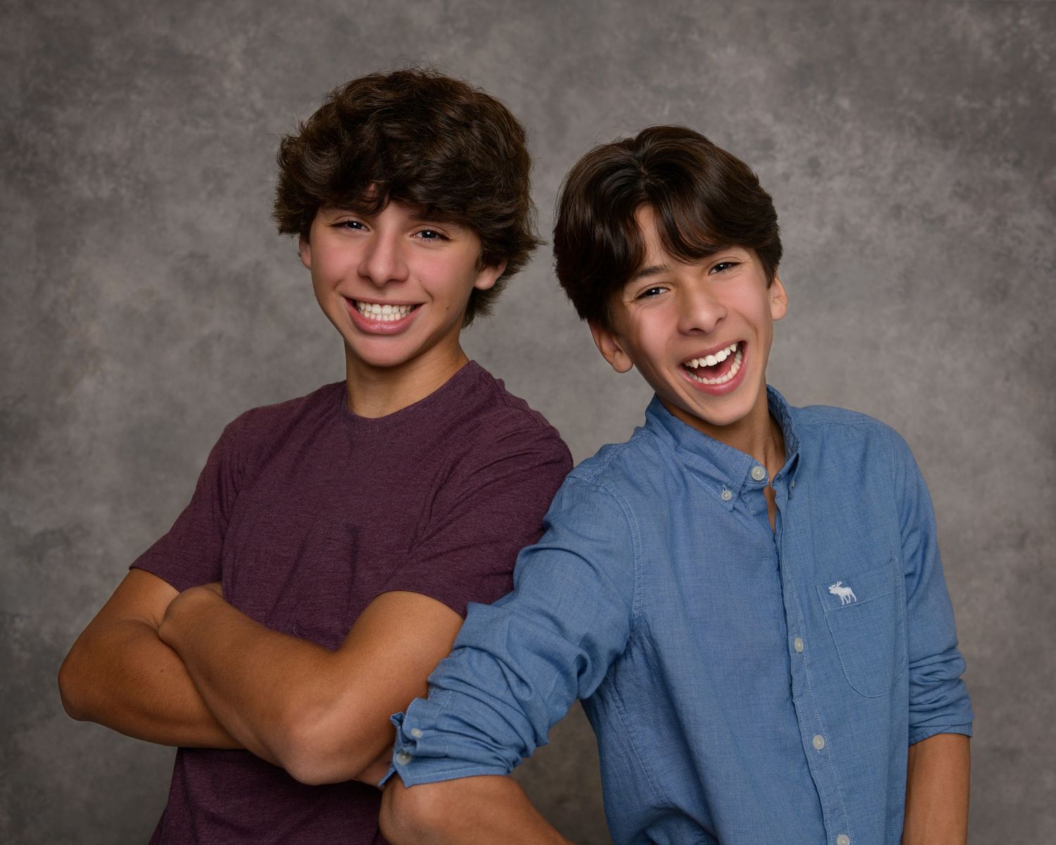 Studio portrait of two teenage brothers photographed by a Houston family photographer