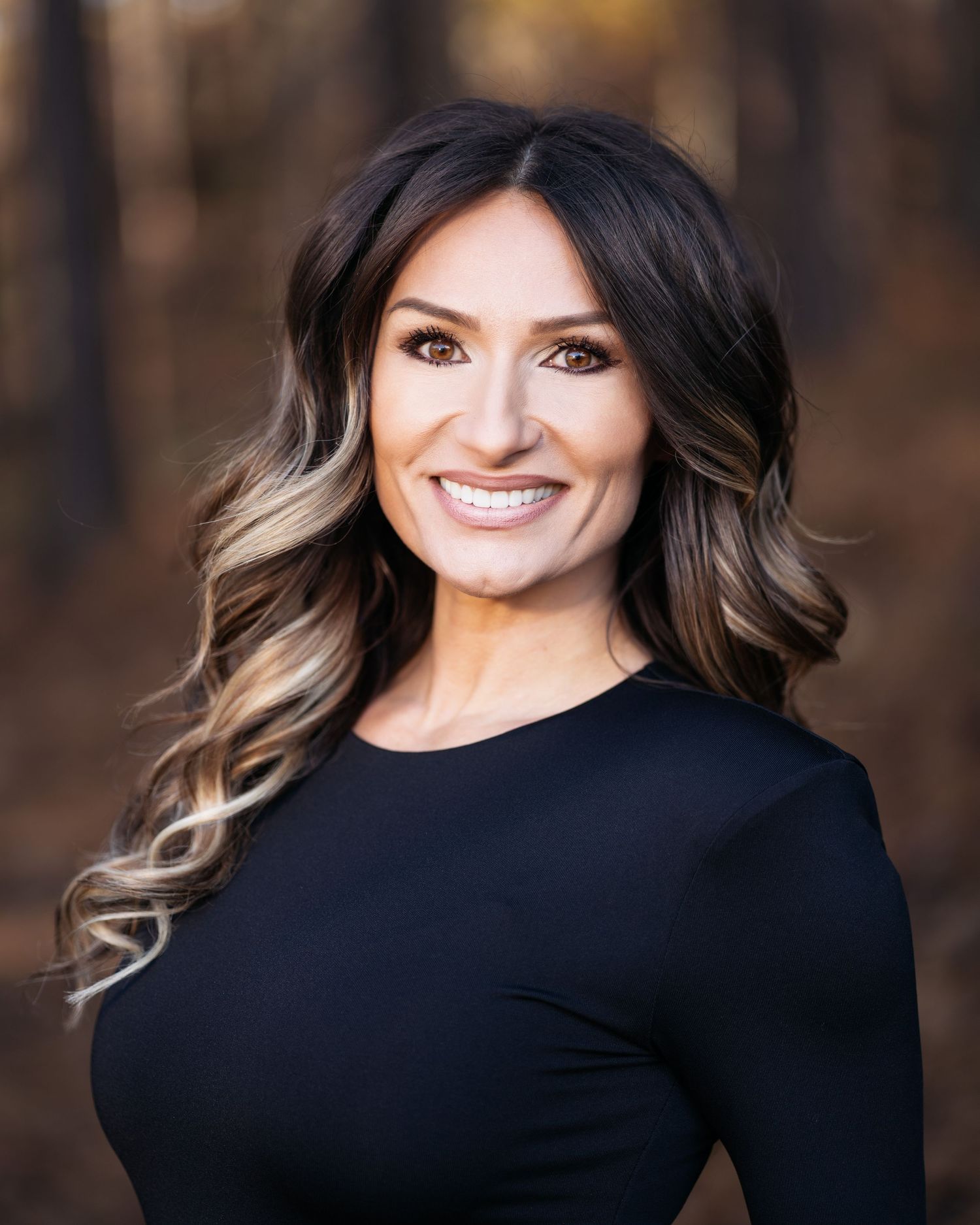 Portrait series showing a person in a black sweater with highlighted hair.