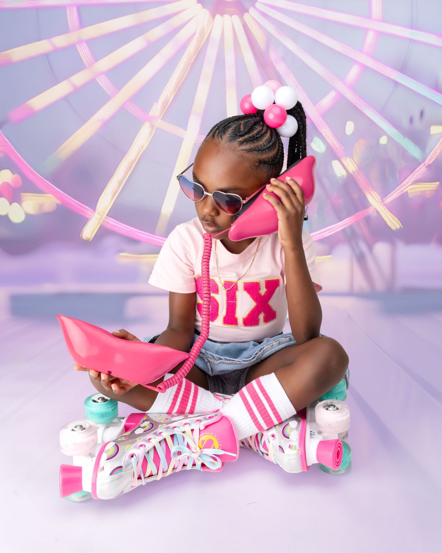 Young dancer in pink and white roller skates strikes playful poses against a purple background with starburst lighting.
