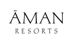 Aman Resorts elegant black and white logo featuring serif typography on a clean white background.