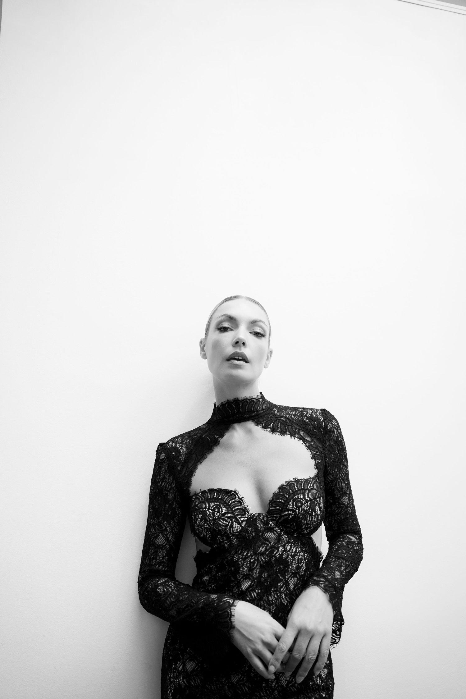 Artistic black and white portrait series against white background.