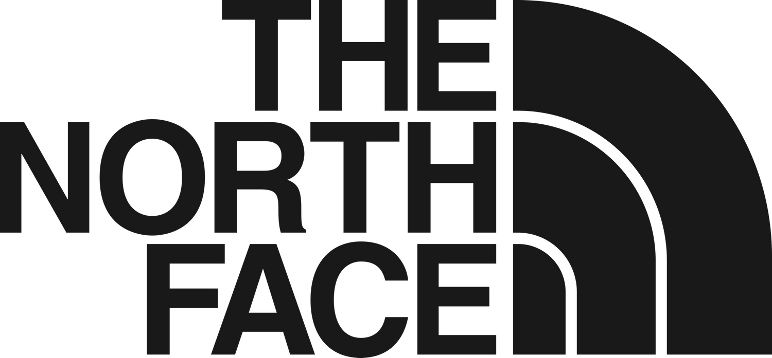 Black monochromatic The North Face logo in circular design on dark background.