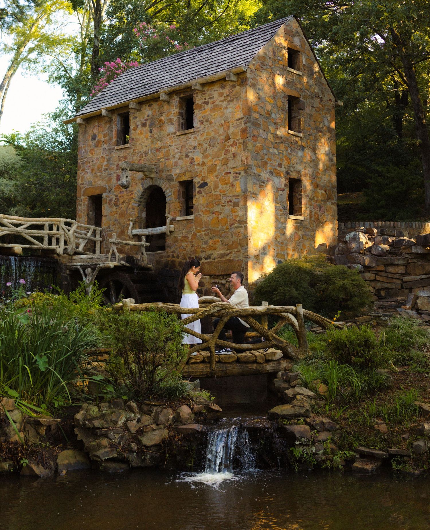 Little Rock Arkansas engagement session featuring a couple at the Old Mill landmark