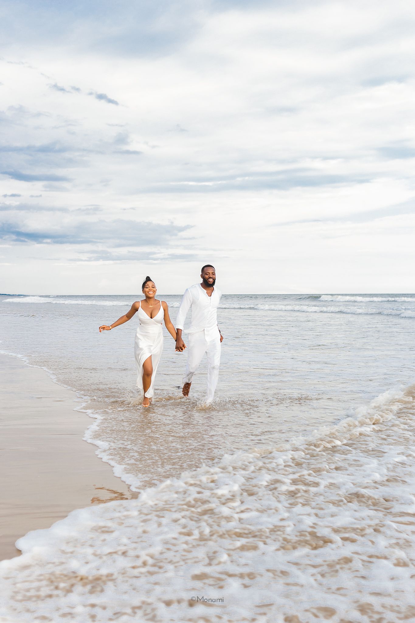 An editorial image of a couple in the beach captured by Monami Photography