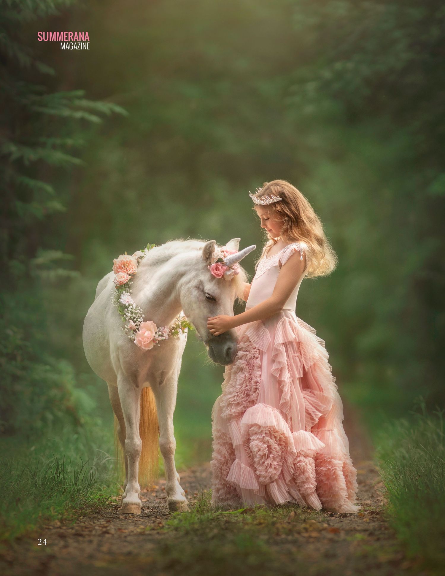 A girl in a pink ruffled gown tenderly pets a white pony adorned with flowers in an enchanted forest setting.