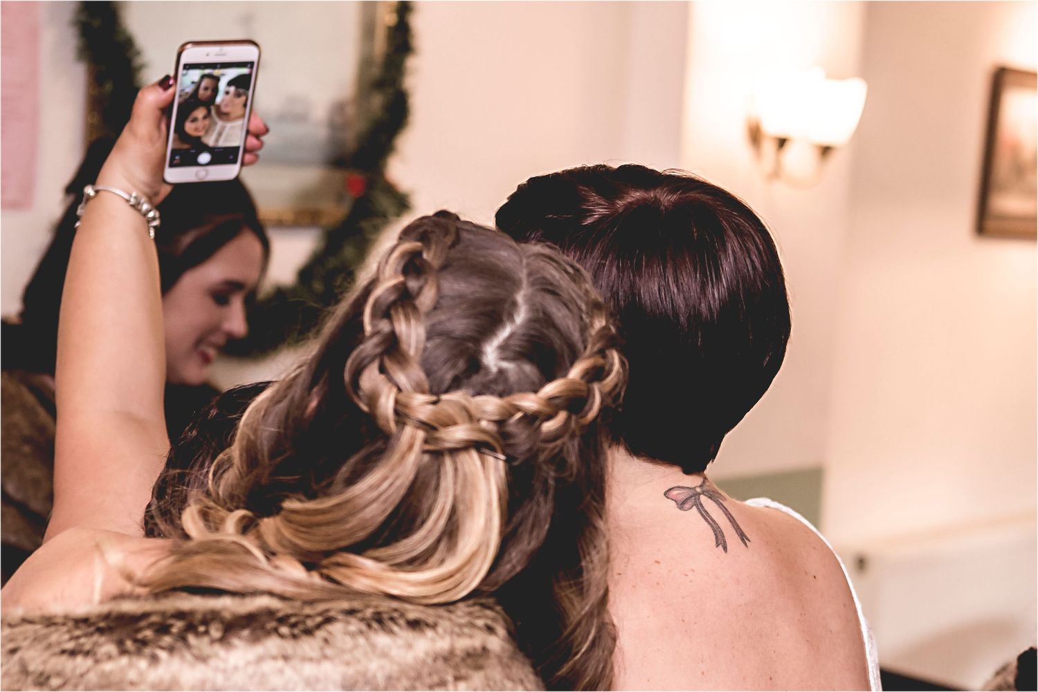 Multiple images showing bride getting ready with detailed shots of intricate braided hairstyle and wedding attire.