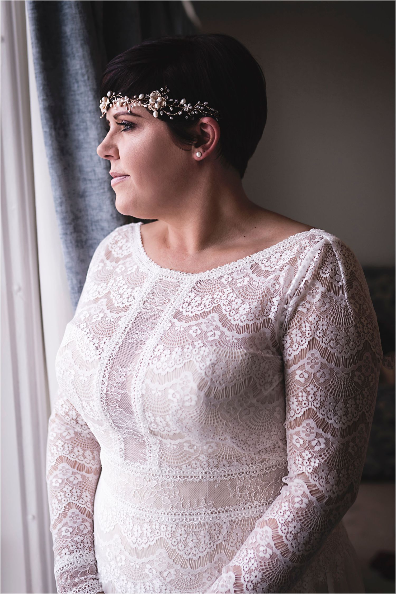 A sequence of photos showing elegant white lace wedding dress details near a curtained window with dramatic lighting.