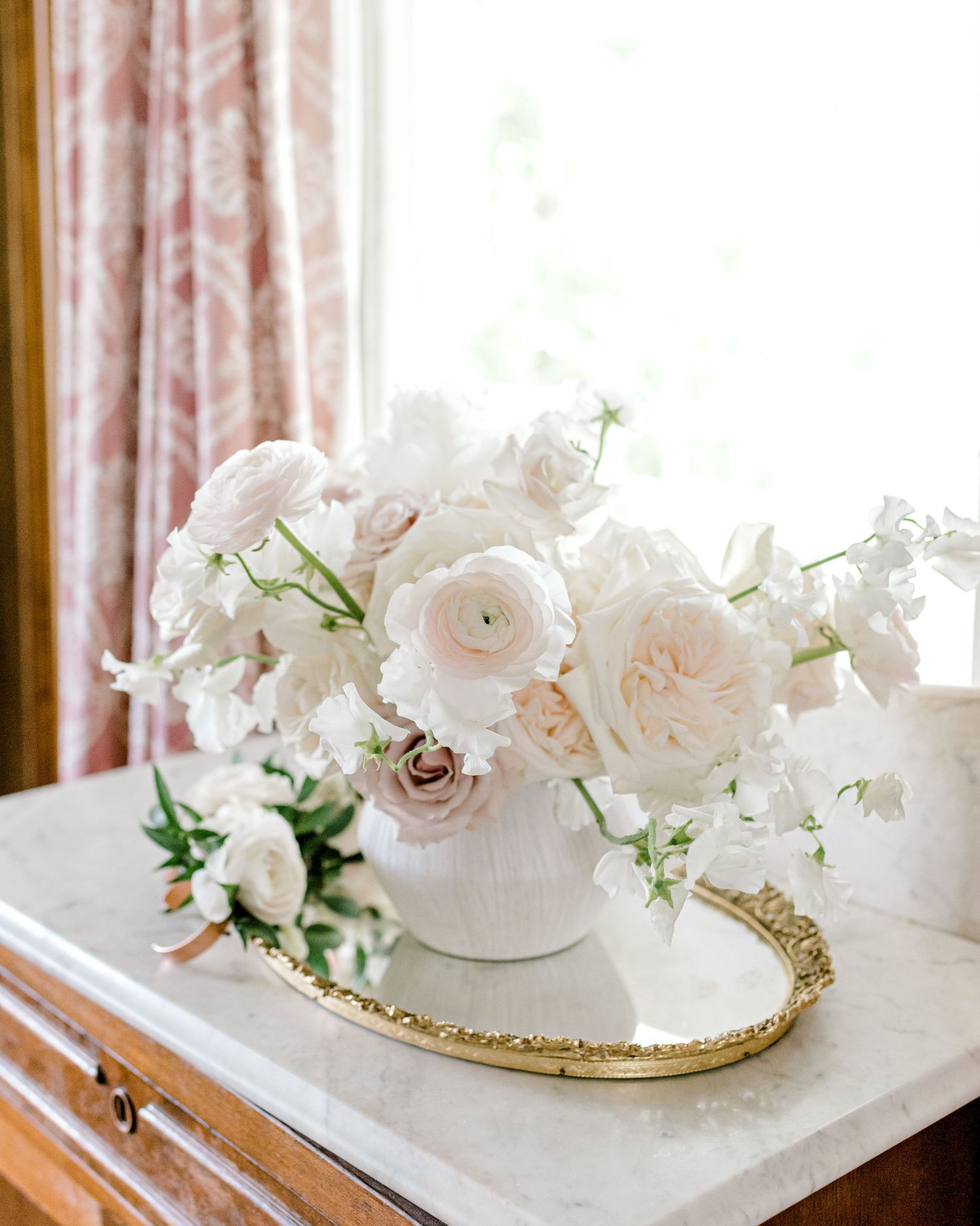 beautiful white and soft pink flowers in a vase