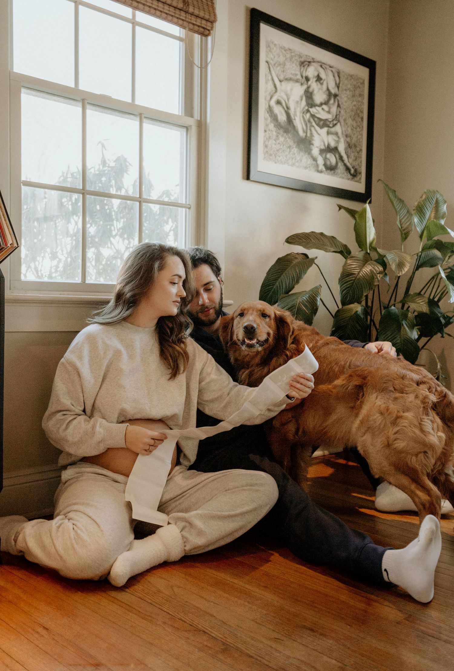 Pregnancy photoshoot in CT with soft light and candid emotion. Maternity photographer near Norwich Connecticut for growing families.