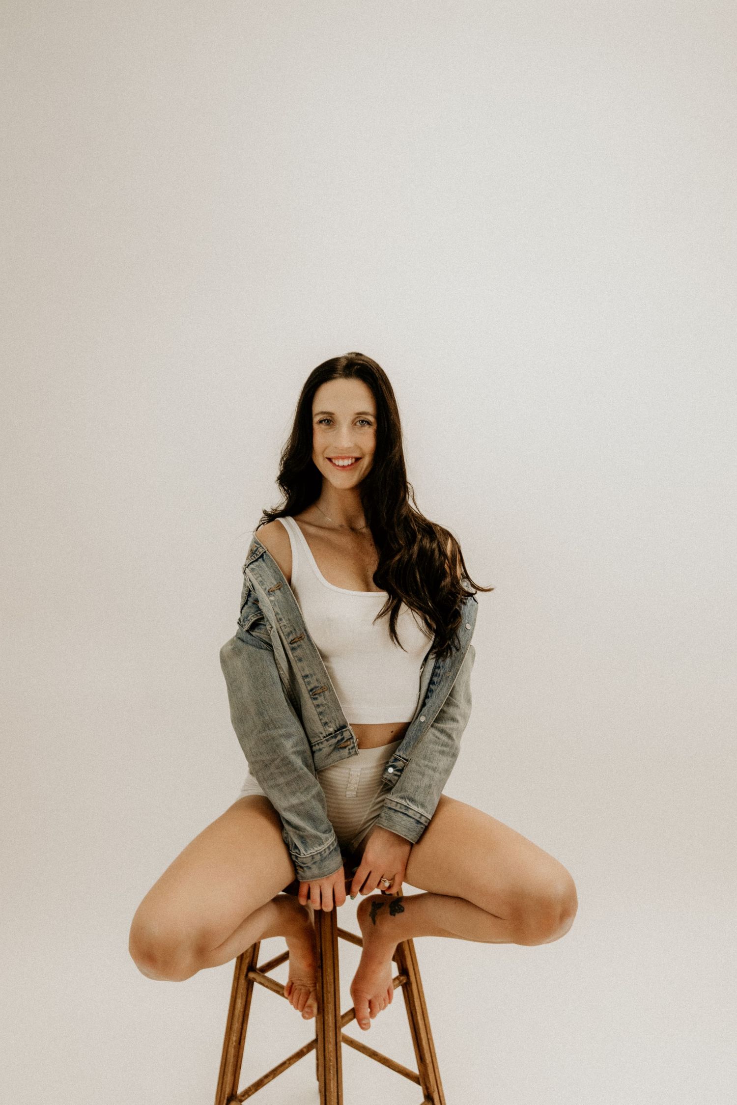 Boudoir photographer in Connecticut creating intimate, natural, and confidence-driven sessions.