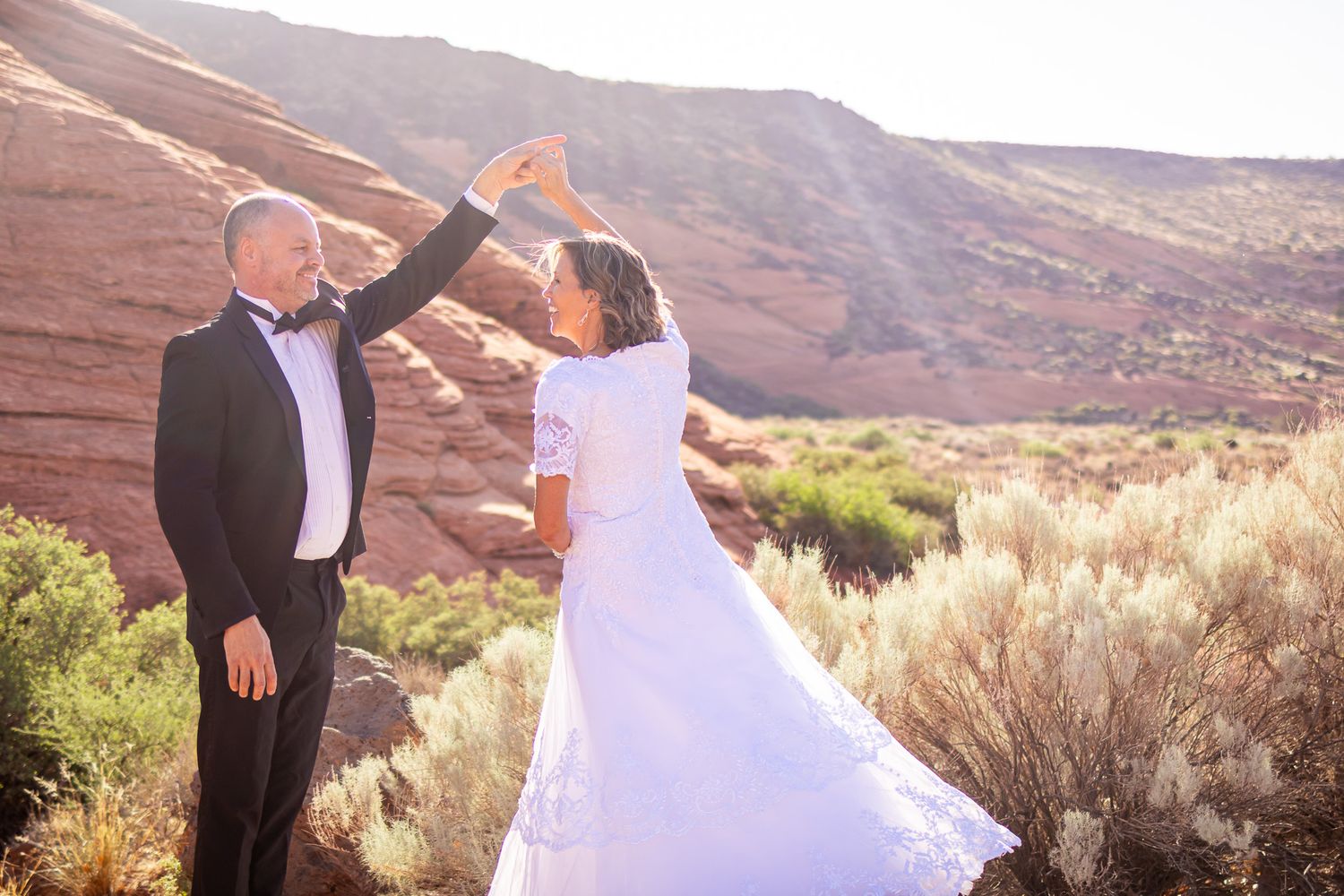 Twirling Bride and Groom in Snow Canyon Utah