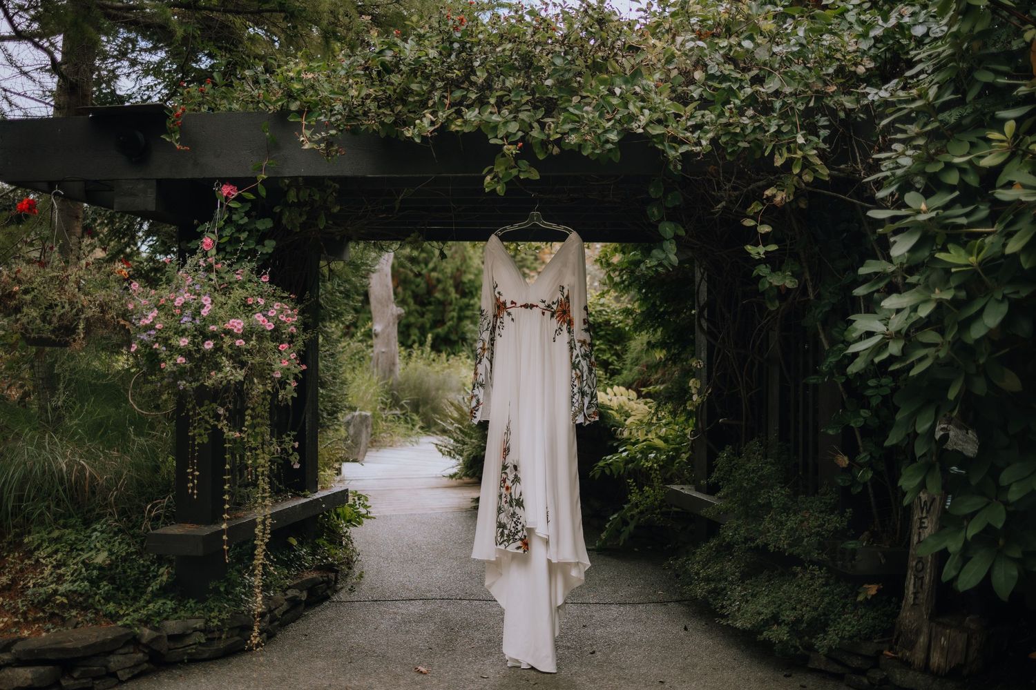 A collection of wedding photos showing a white dress and garden pathway in an elegant outdoor setting.