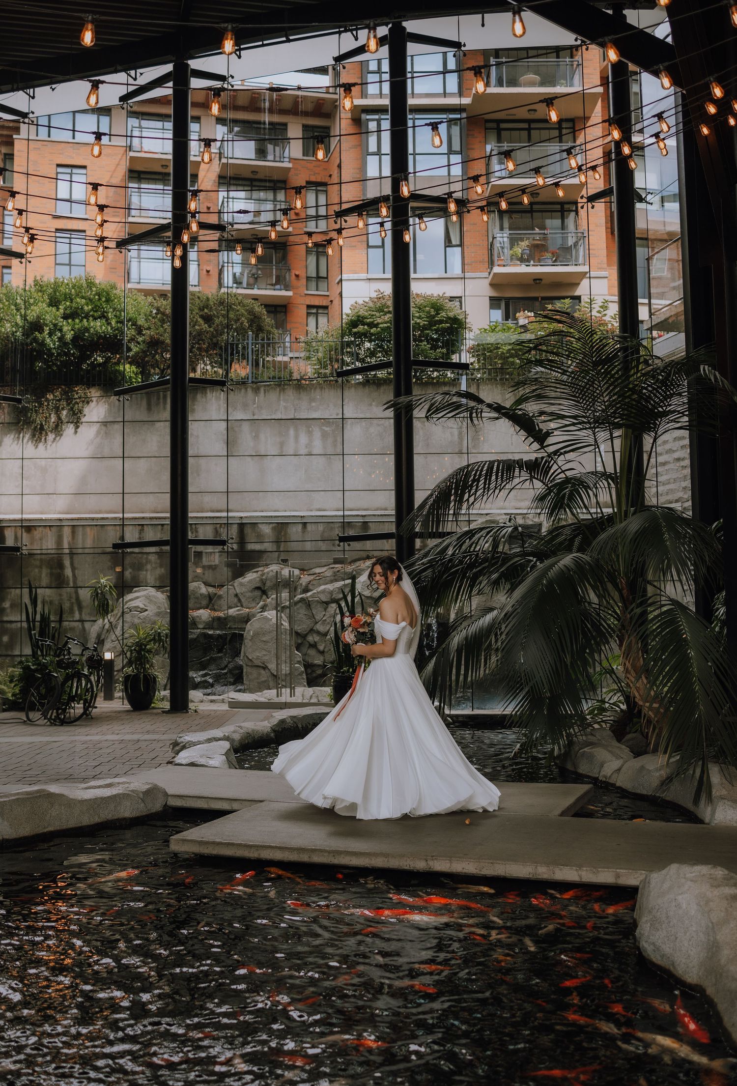 koi pond bride photo at the Parkside hotel downtown Victoria wedding