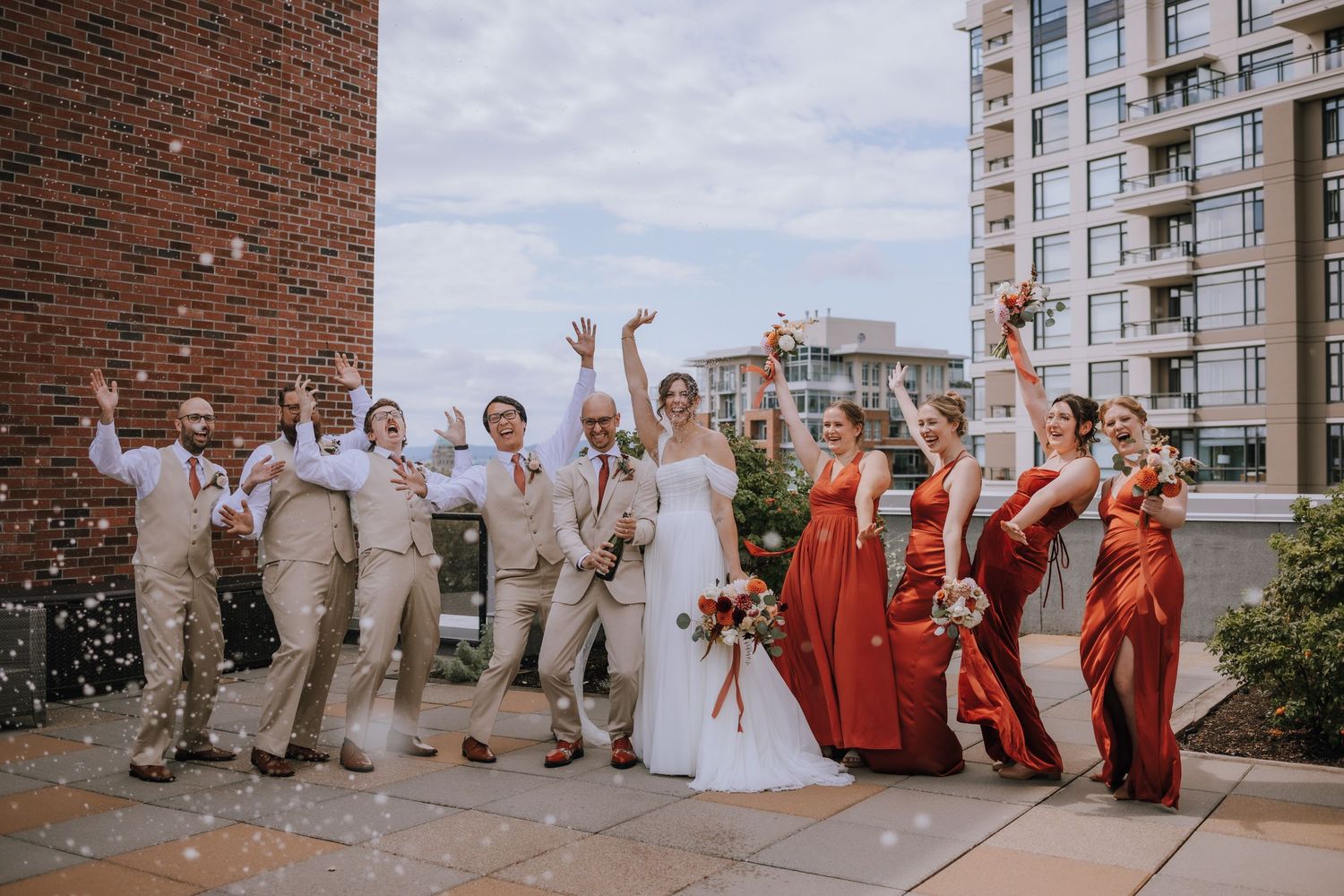 rooftop celebration with wedding party in summer at Parkside hotel downtown Victoria vancouver island BC