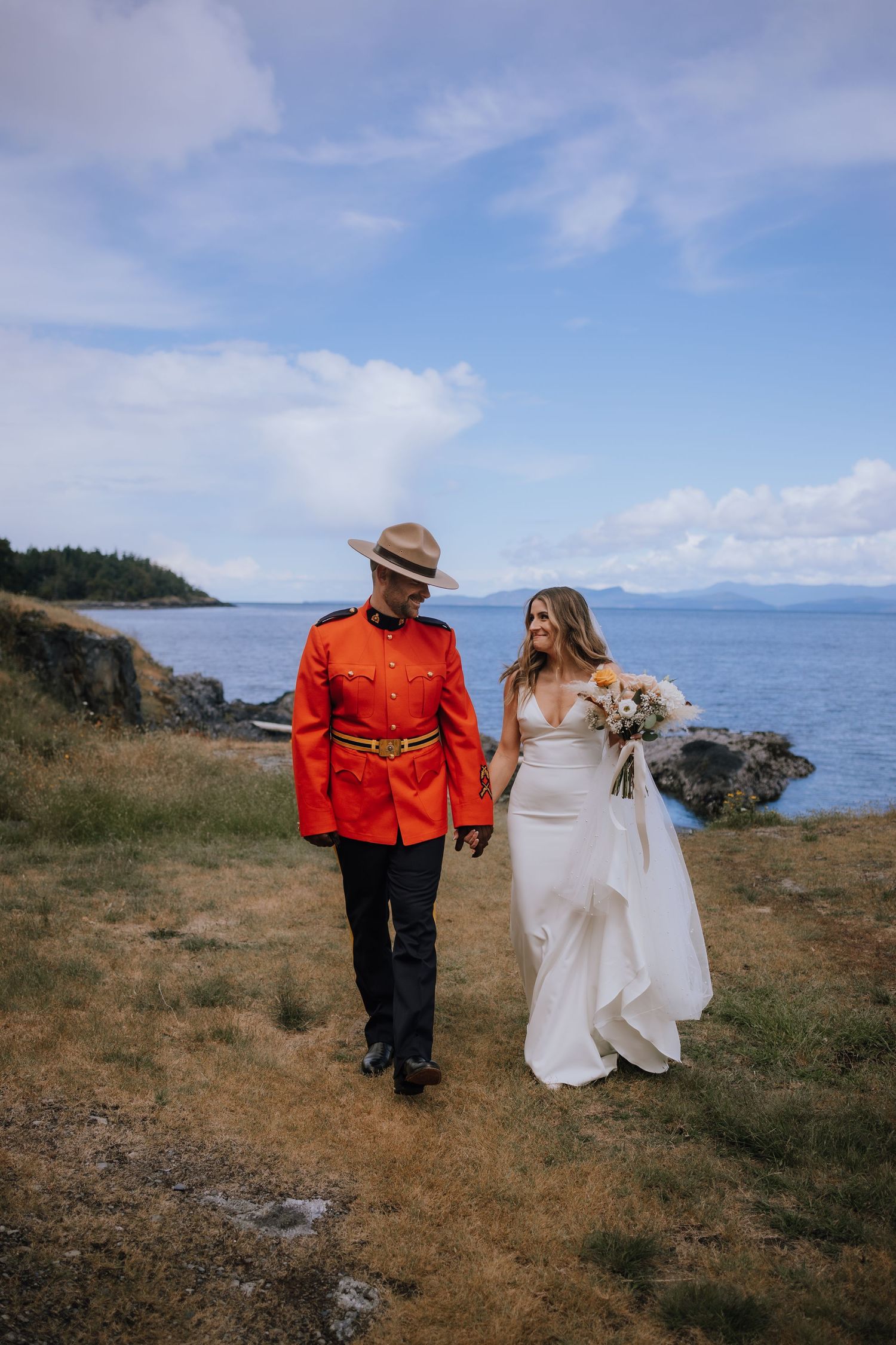 Couple on their wedding day during portraits in Nanoose Bay before their ceremony at the beach club resort in parksville