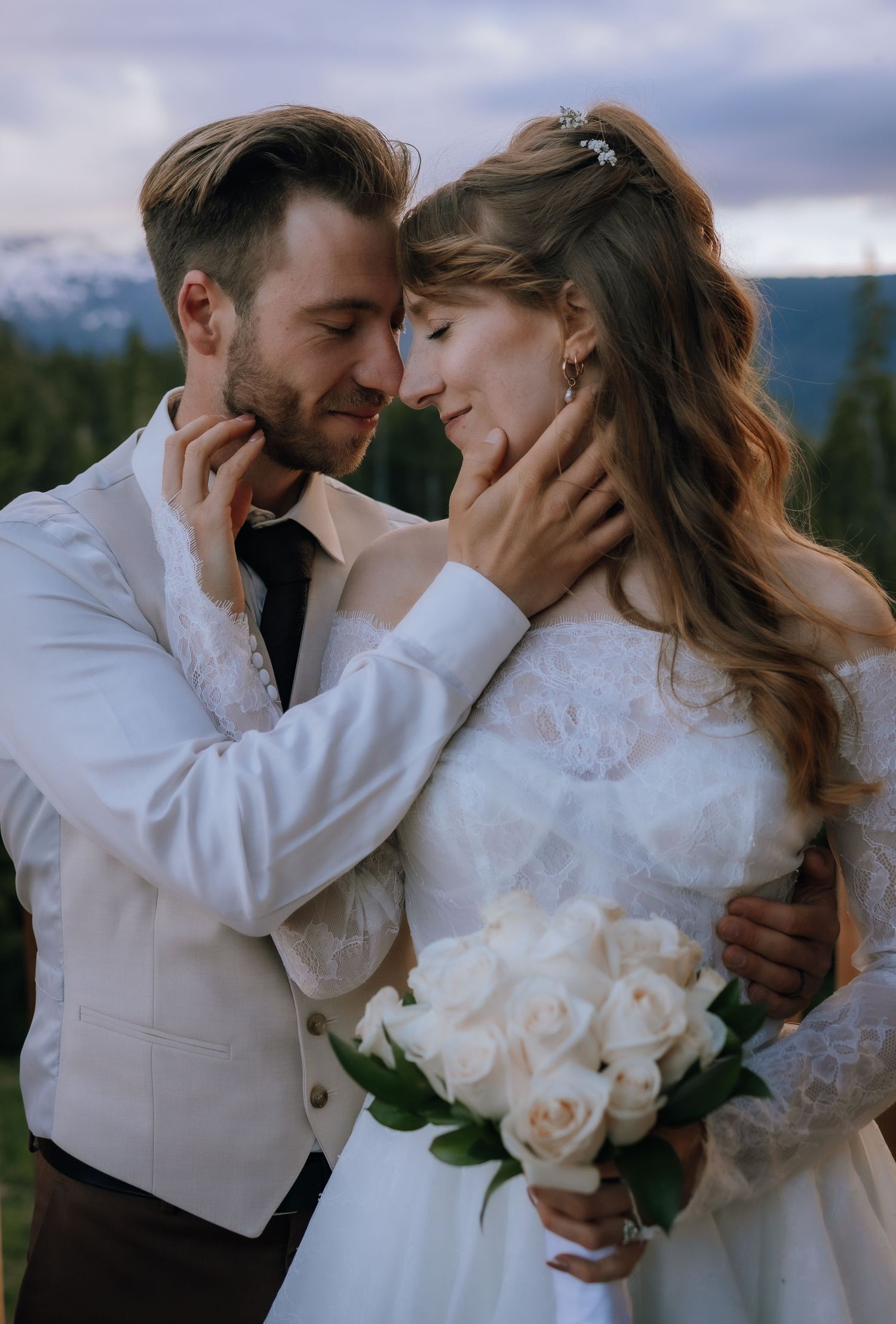 romantic sunset portrait of bride and groom at Raven lodge on mount Washington, vancouver island bc