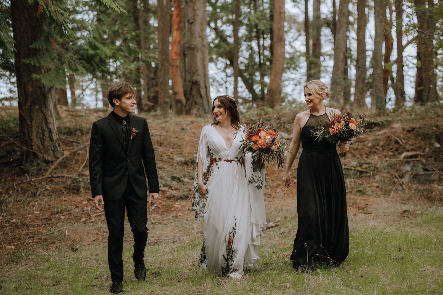 wedding party photo walking in the forest