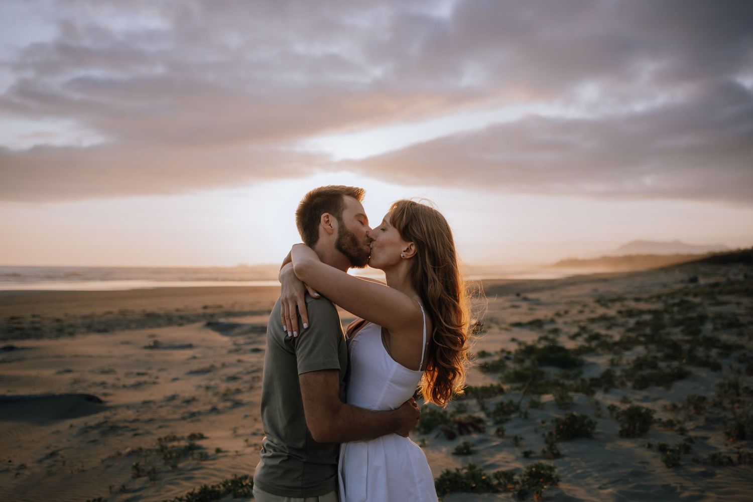 romantic tofino engagement session at sunset on chestermans beach