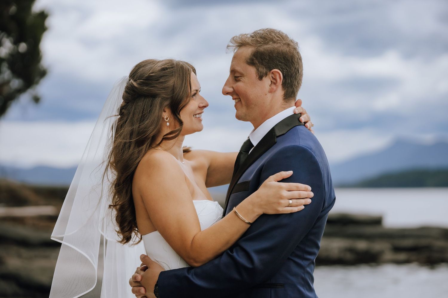 bride and groom first look on salt spring island at arbutus point, close to stone bridge island farm