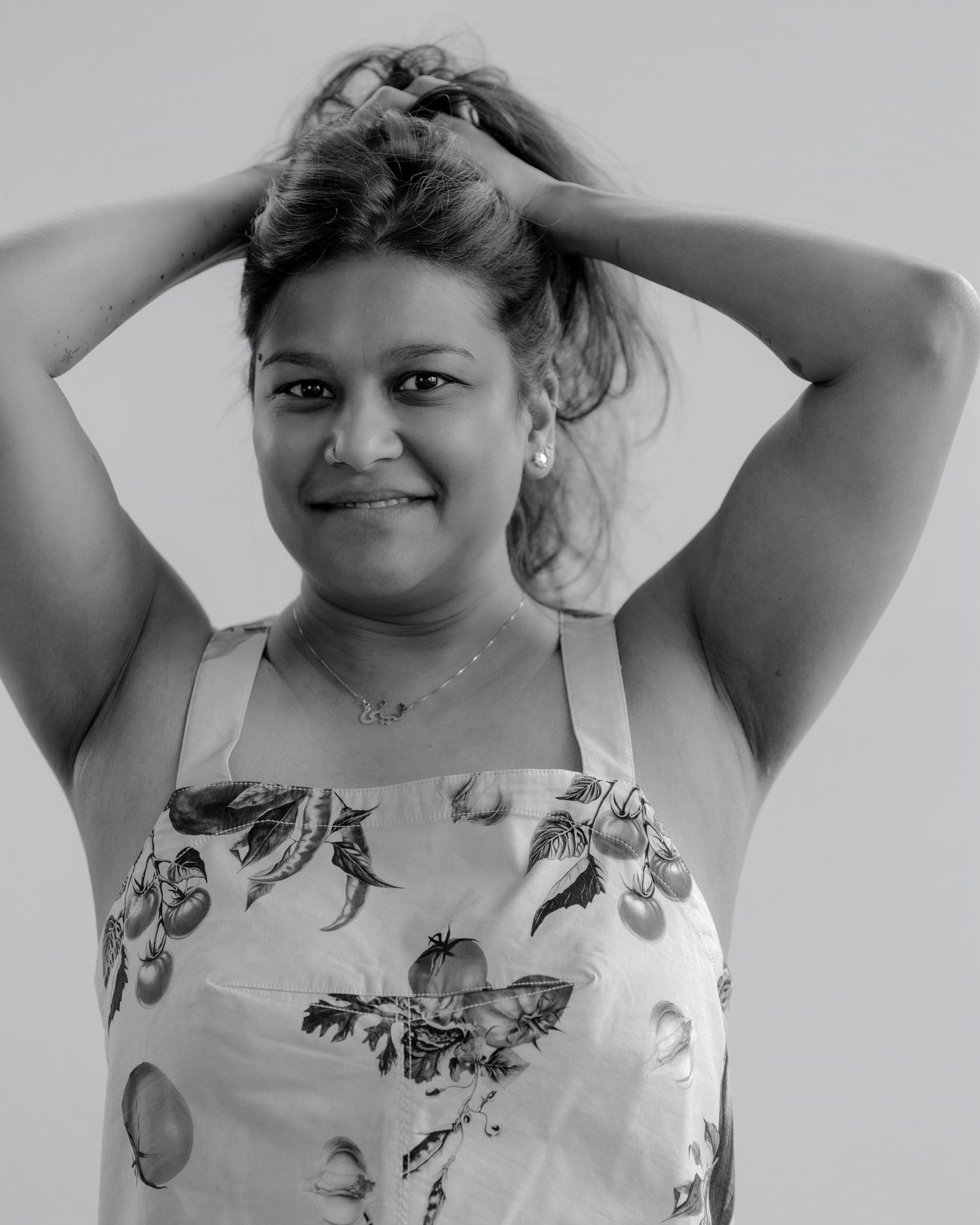 Light-hearted portrait sequence showing playful gestures and expressions.