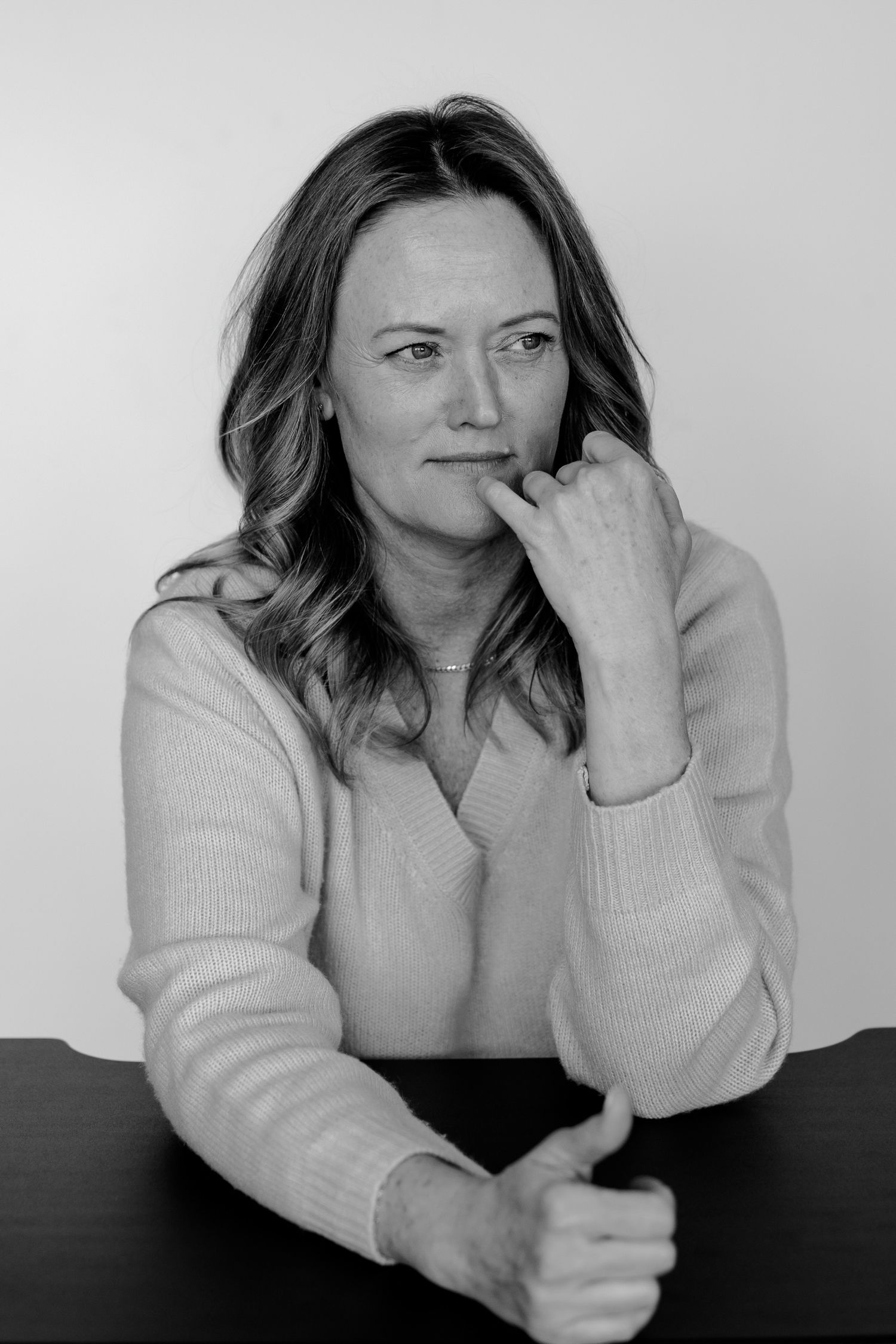 Moody monochrome portrait series displaying contemplative and thoughtful expressions.