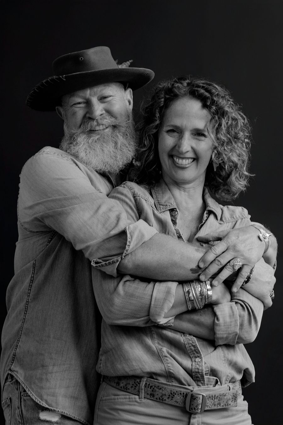 Series of intimate black and white photos showing couple's loving interaction.