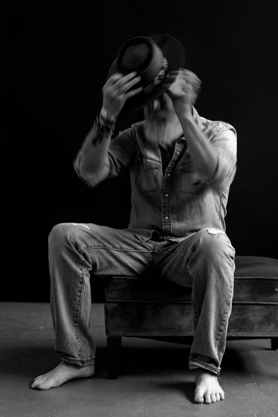 Dynamic poses captured in dark setting showing denim-clad figure on bench.