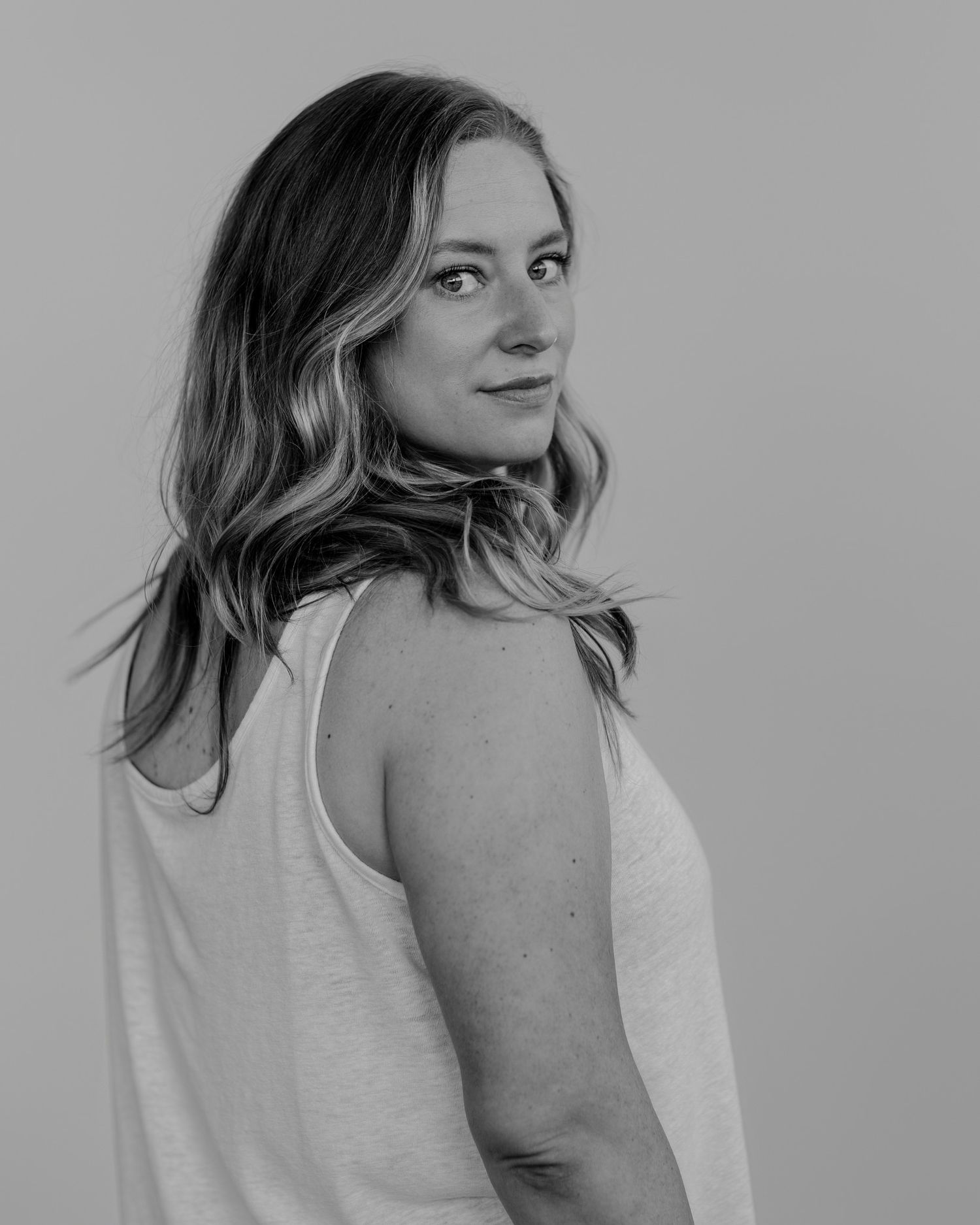 Natural portrait sequence in light setting showing casual poses.
