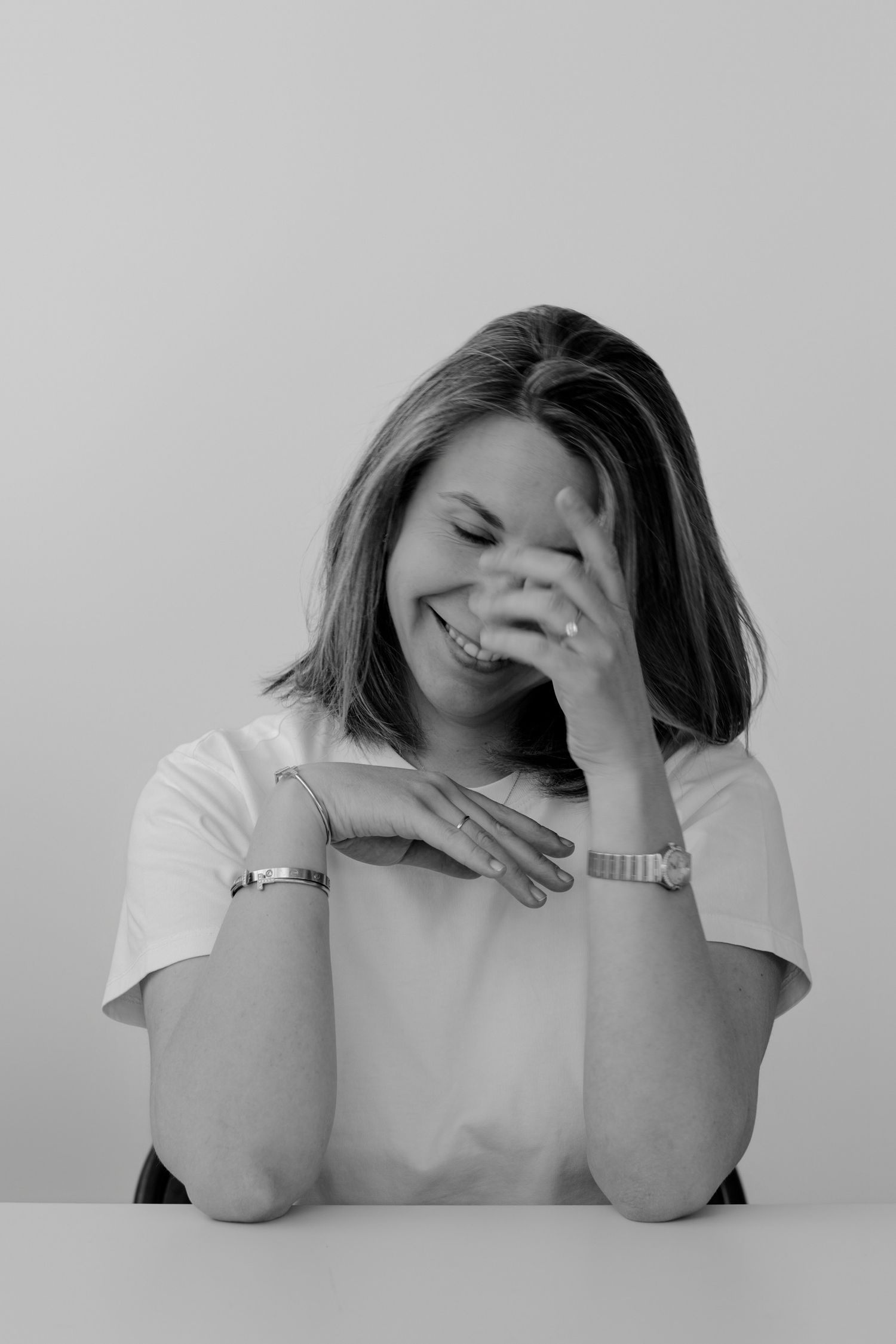 Black and white series showing emotional expressions of frustration and exhaustion.
