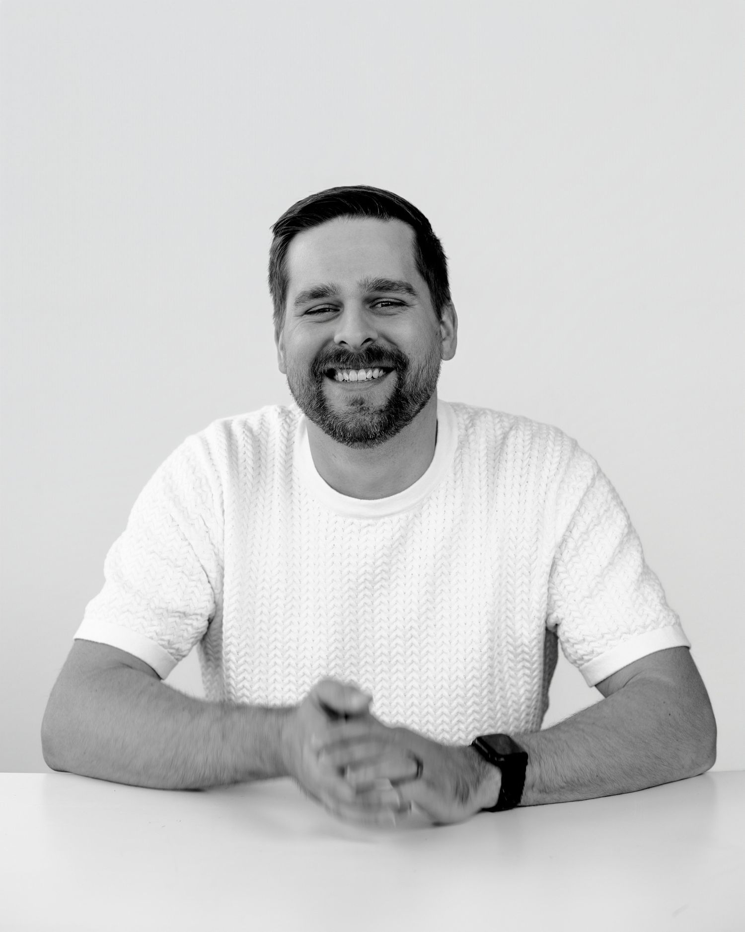 Person in white t-shirt demonstrating series of animated gestures and expressions.