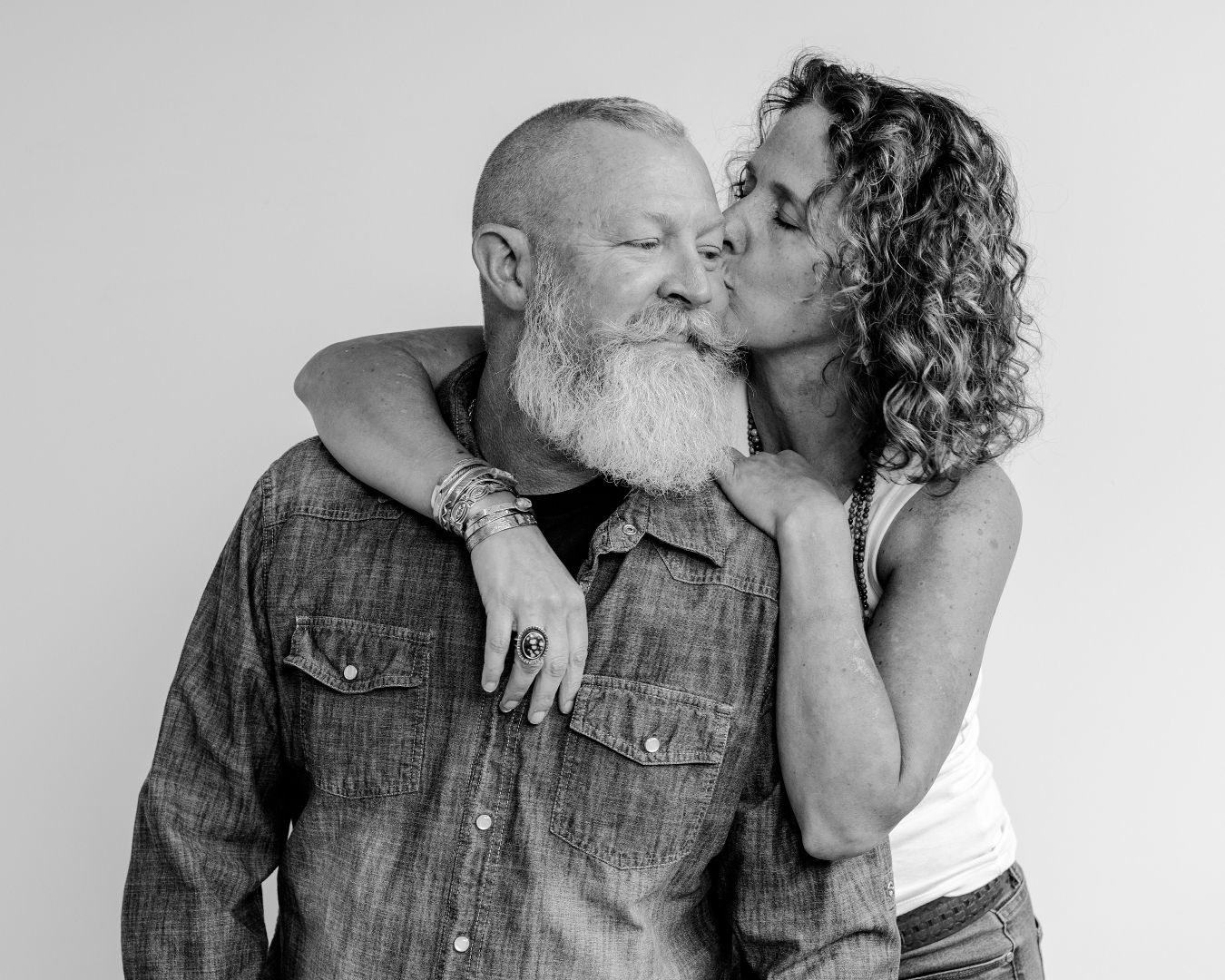 Close up photo series of couple sharing tender moments in black and white.