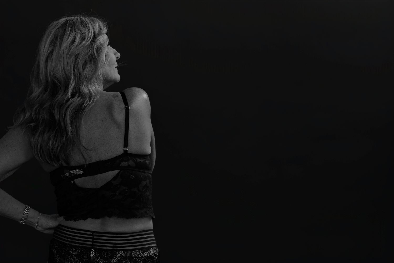 Artistic black and white photography with dynamic movement and contrast.