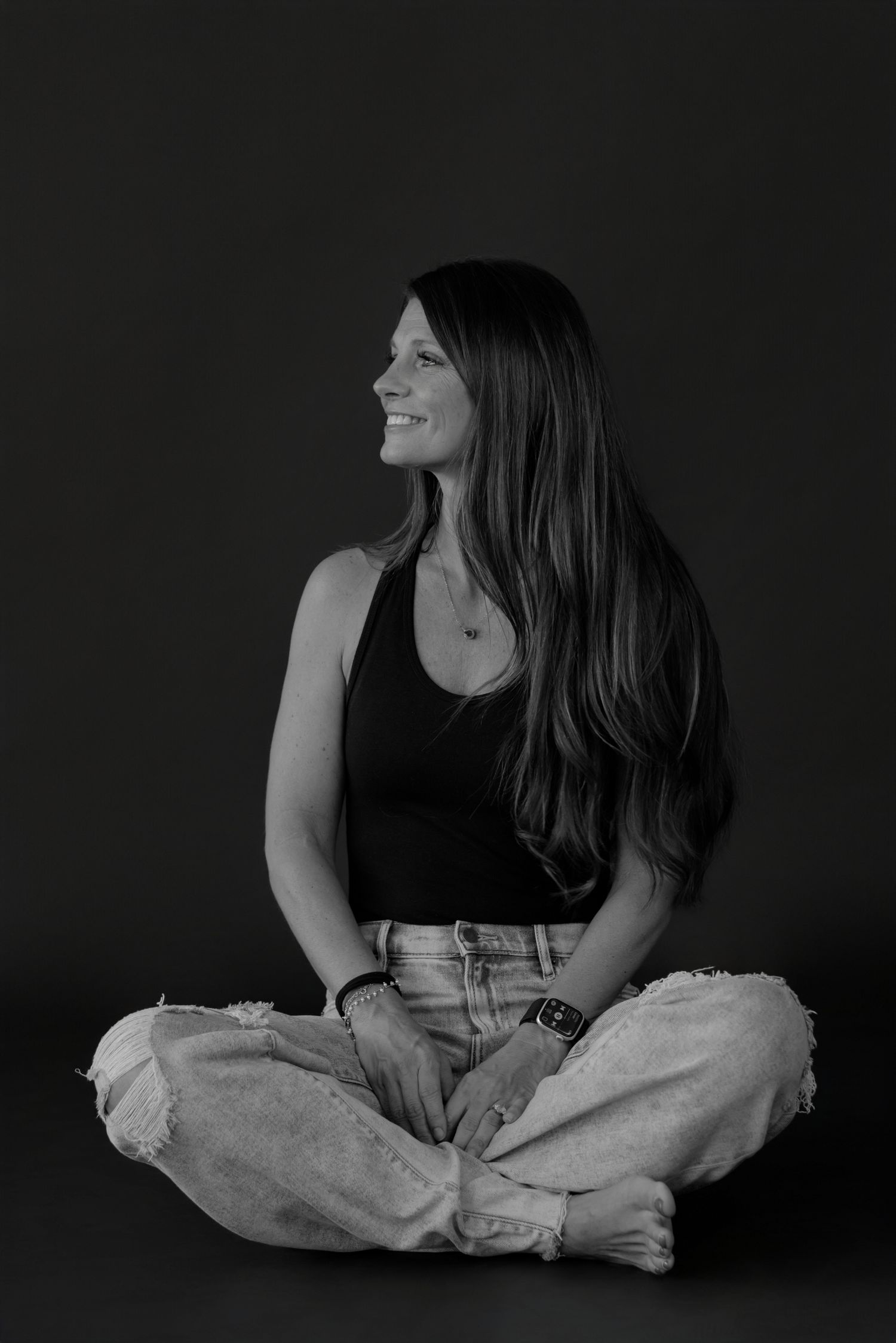 Artistic black and white portraits showing natural, candid moments on floor.