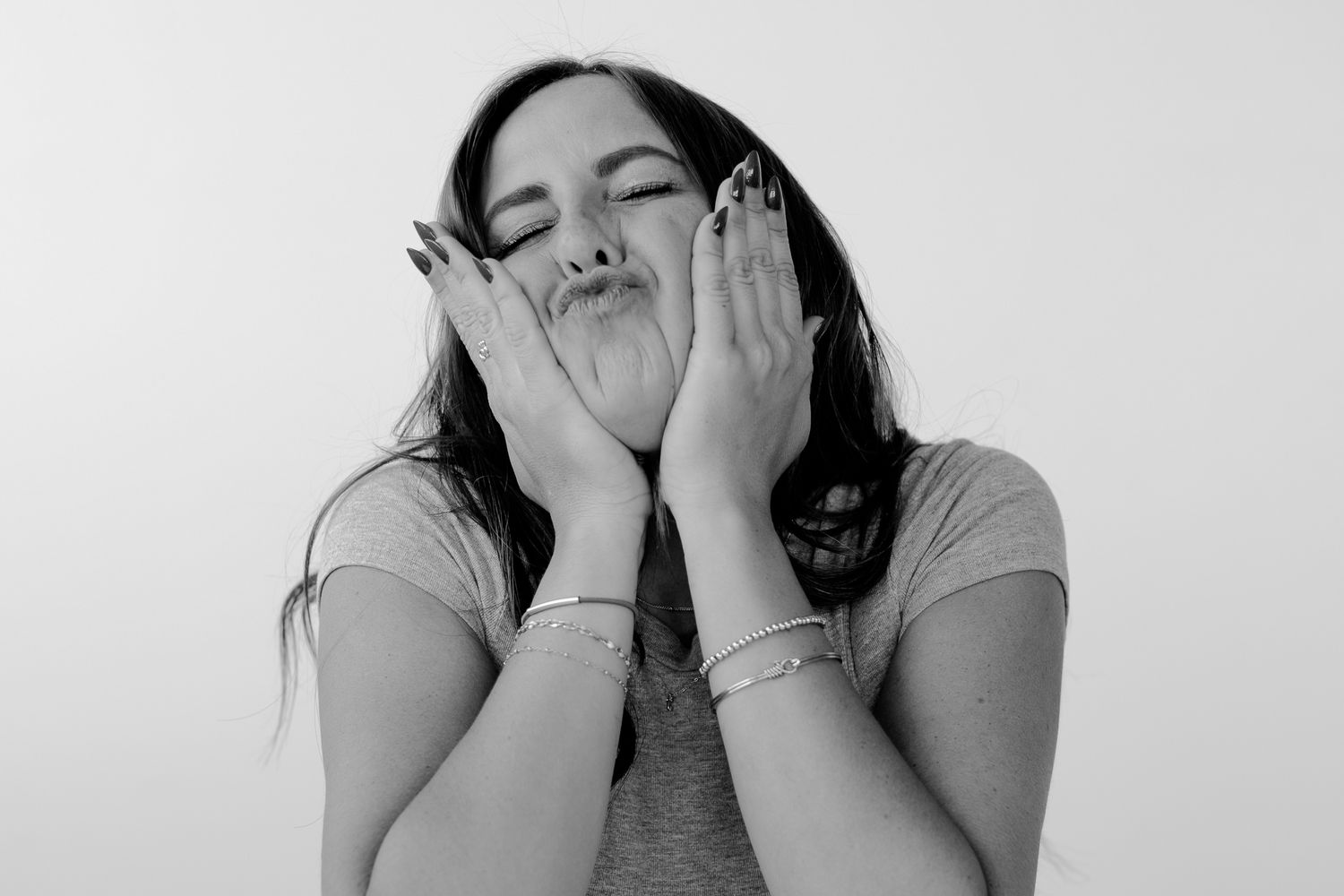 Series showing emotional expressions and genuine laughter in black and white style.