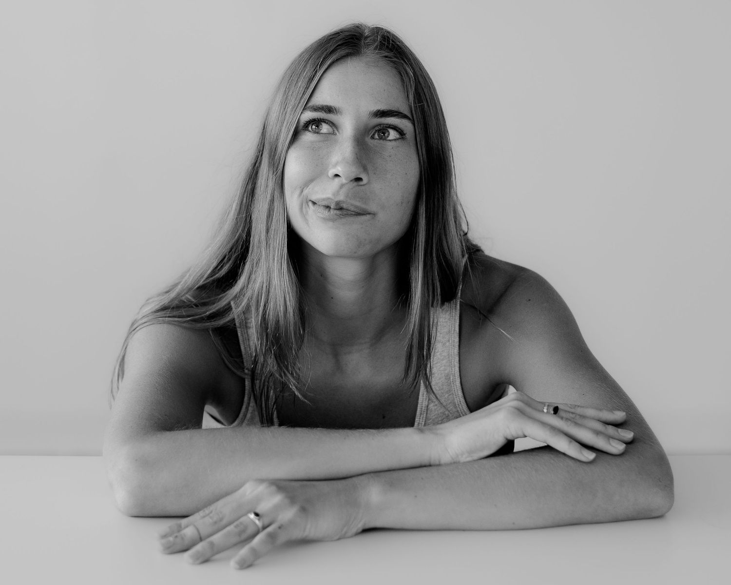 Clean monochrome portrait sequence showing quiet contemplative moments.