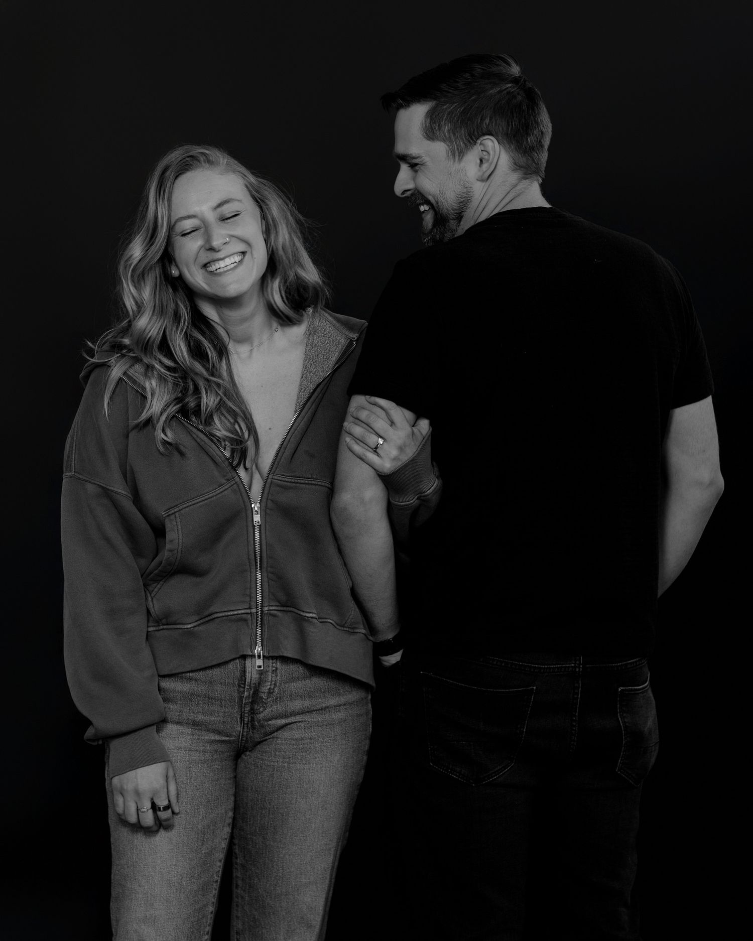 Emotional black and white photography series showing couple's connection in casual outfits.