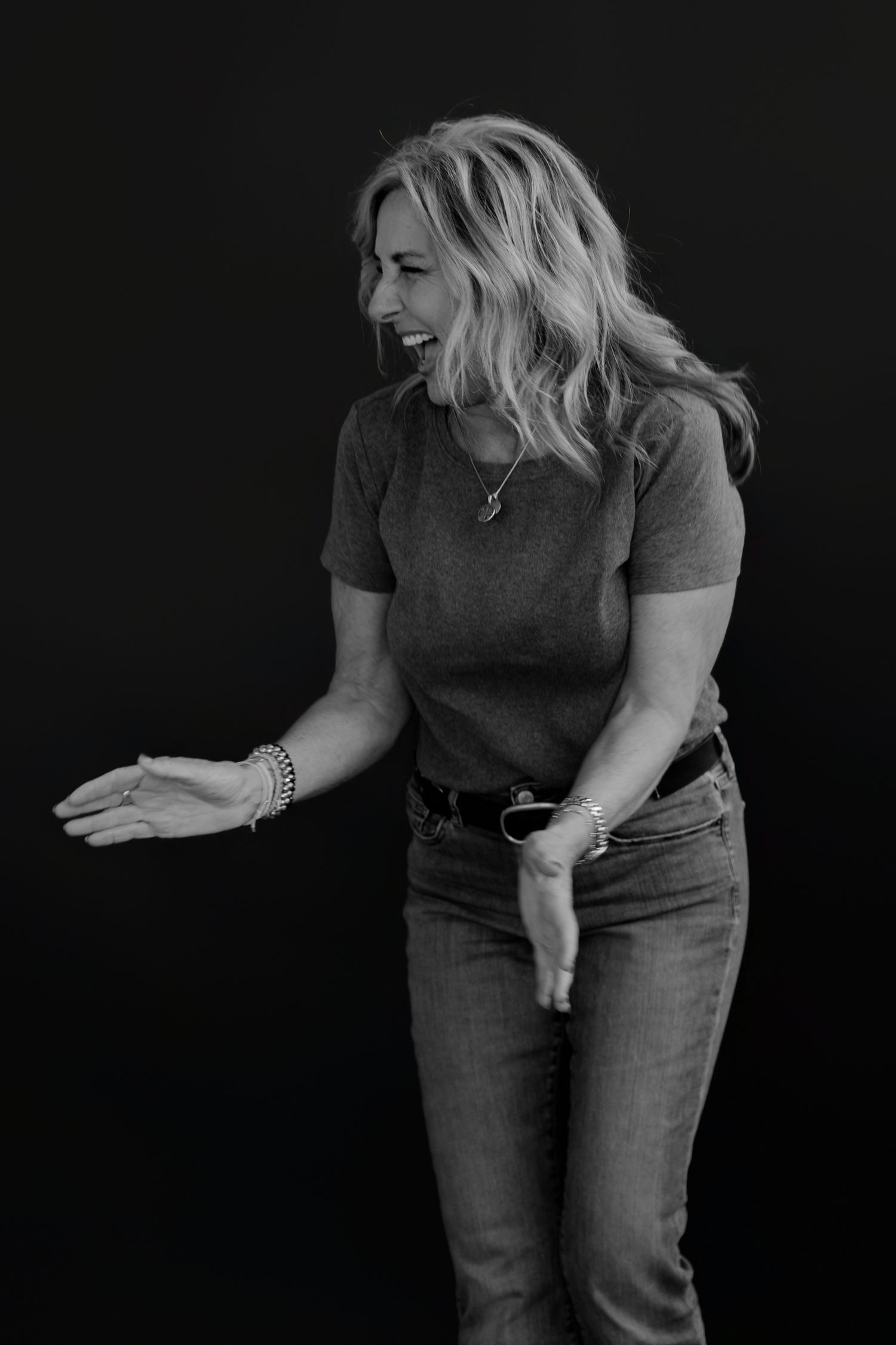 Casual portrait sequence showing animated movements in grey clothing against black background.