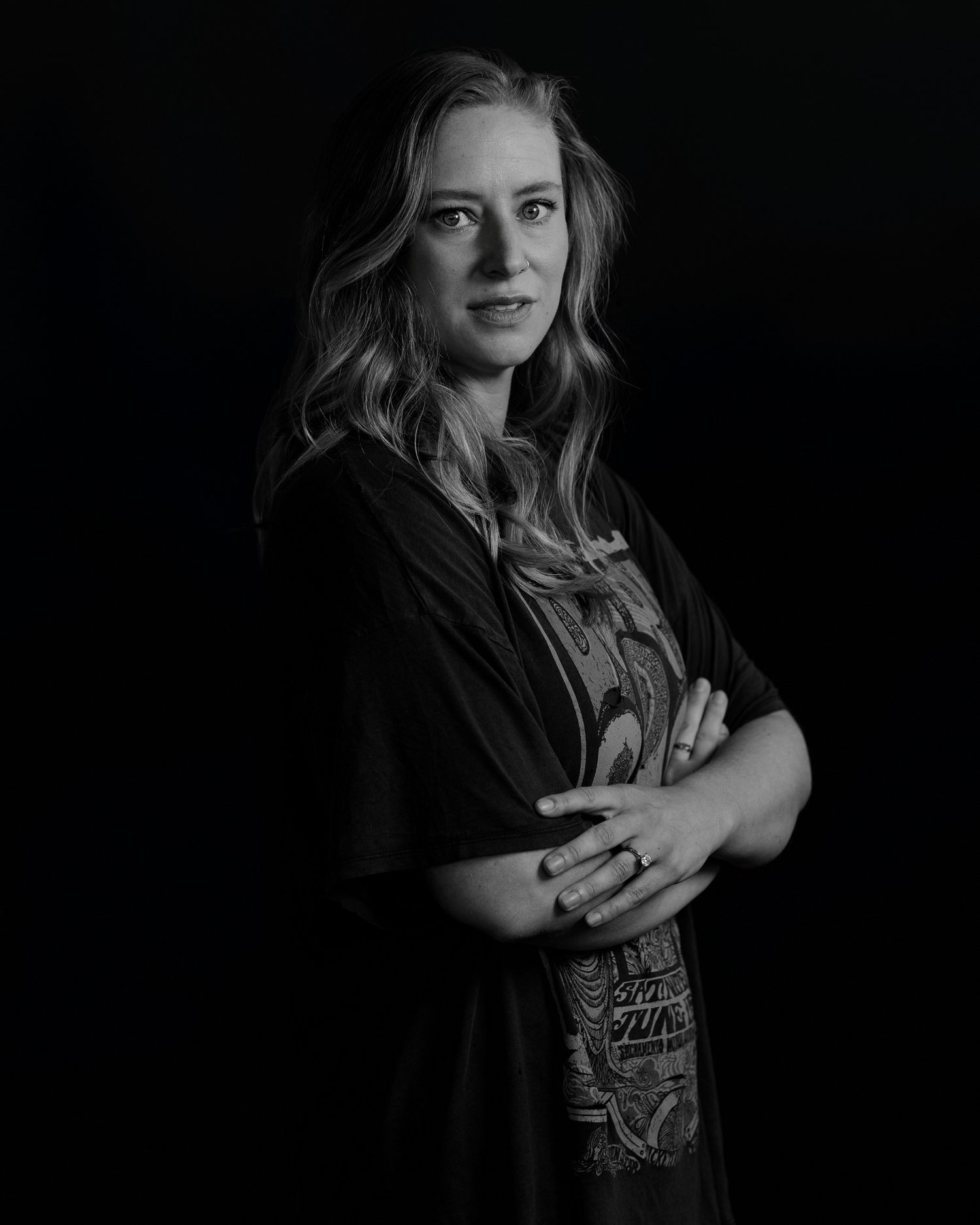 Expressive portrait series showing range of emotions in dark setting.