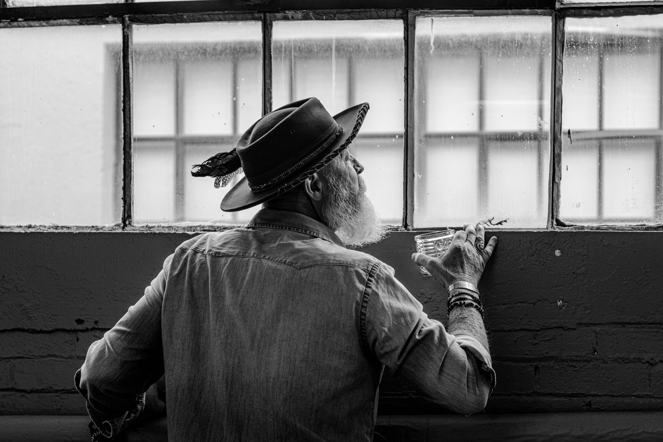 Minimalist black and white composition showing windows with natural light.