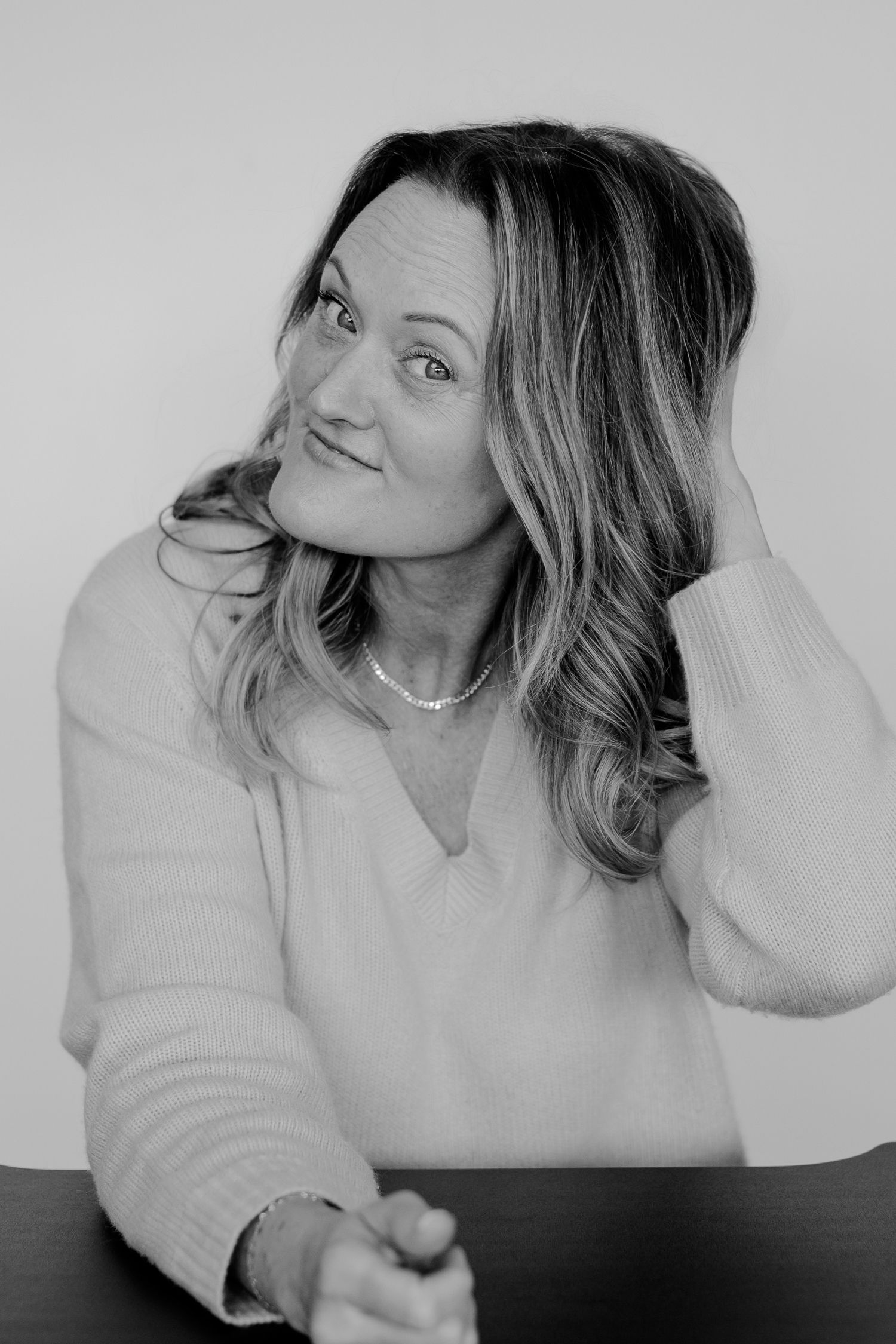 A sequence of natural, candid expressions captured in black and white photography.