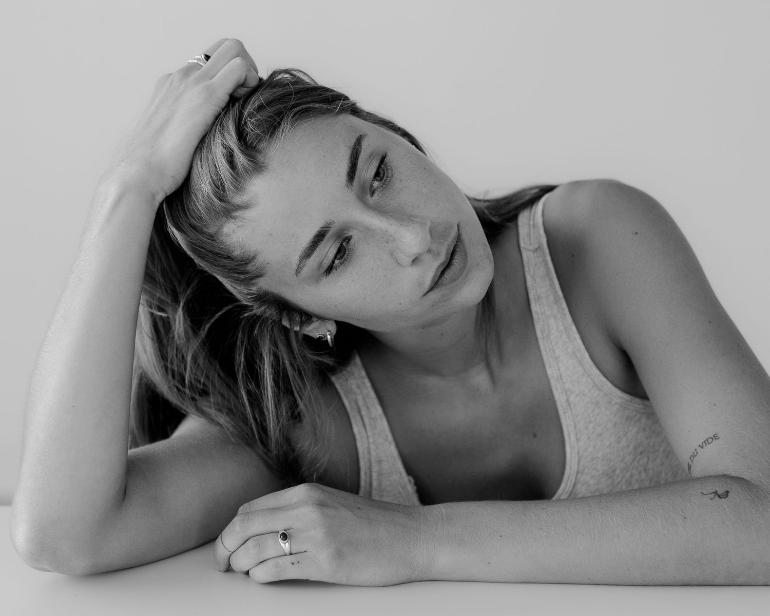 Monochrome series capturing reclining poses and contemplative moments.