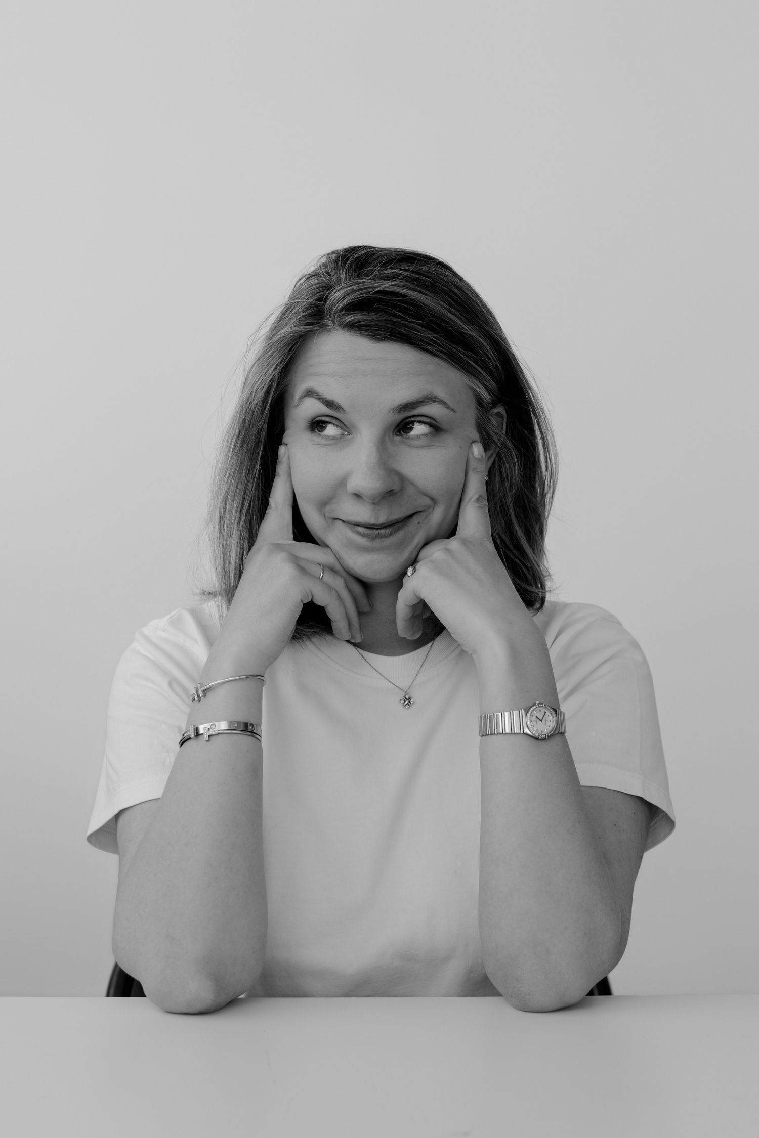 Series of black and white photos displaying a range of thoughtful and mischievous expressions.
