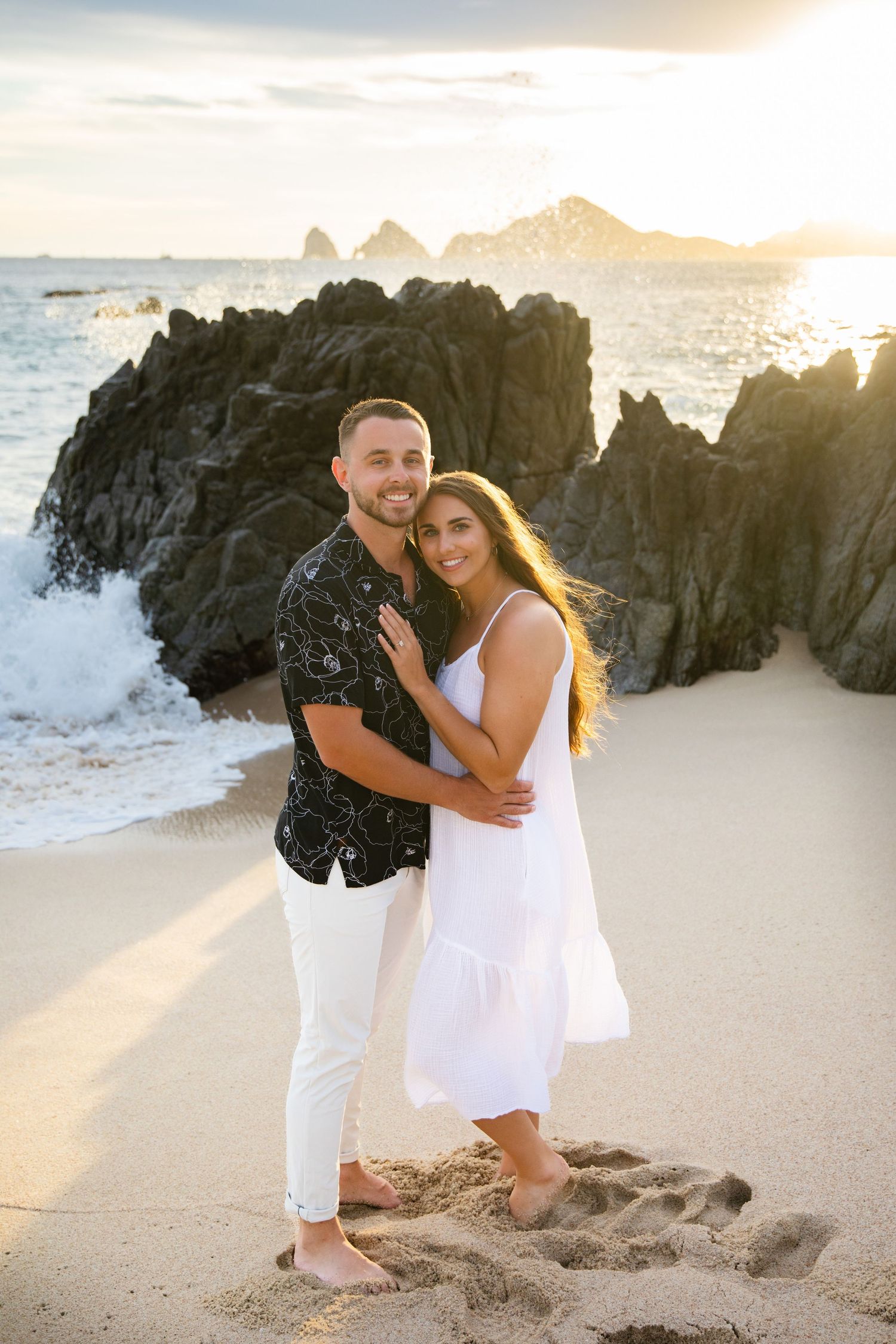 engaged couple on beach in Cabo San Lucas